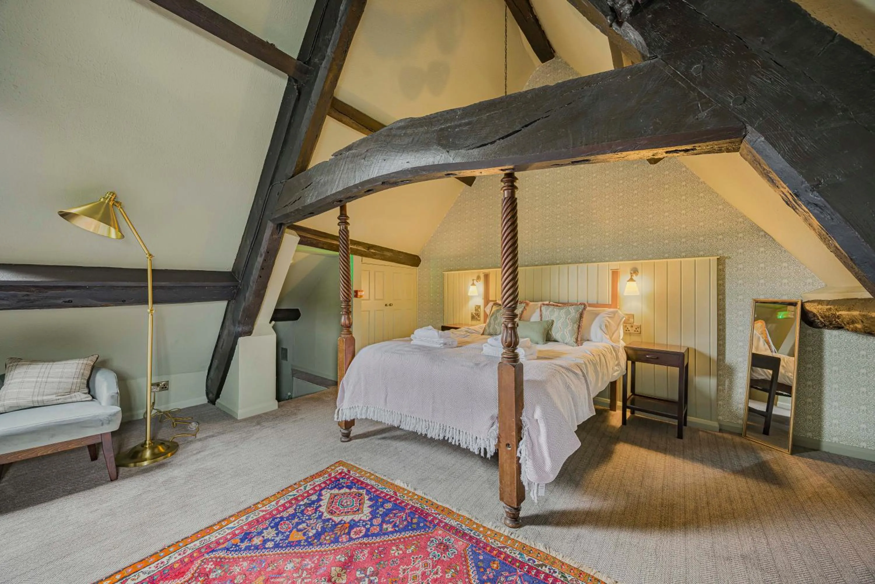 Bed in The Golden Pheasant Inn