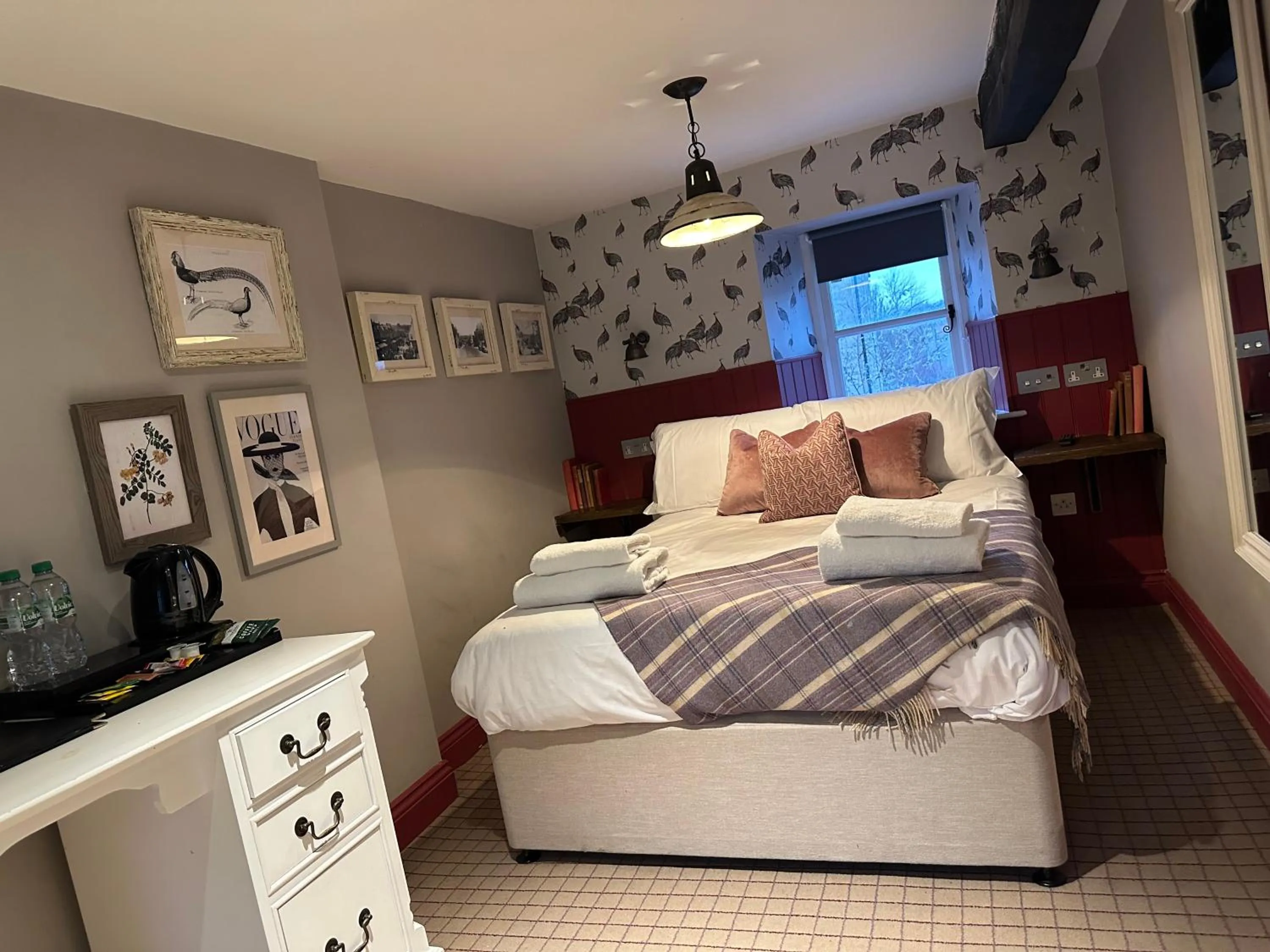 Bed in The Golden Pheasant Inn