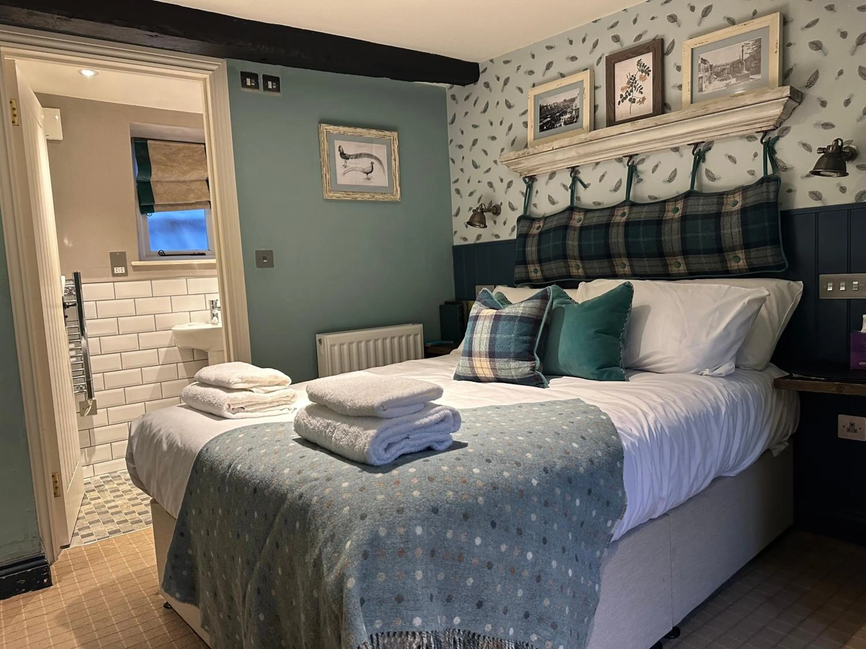 Bed in The Golden Pheasant Inn