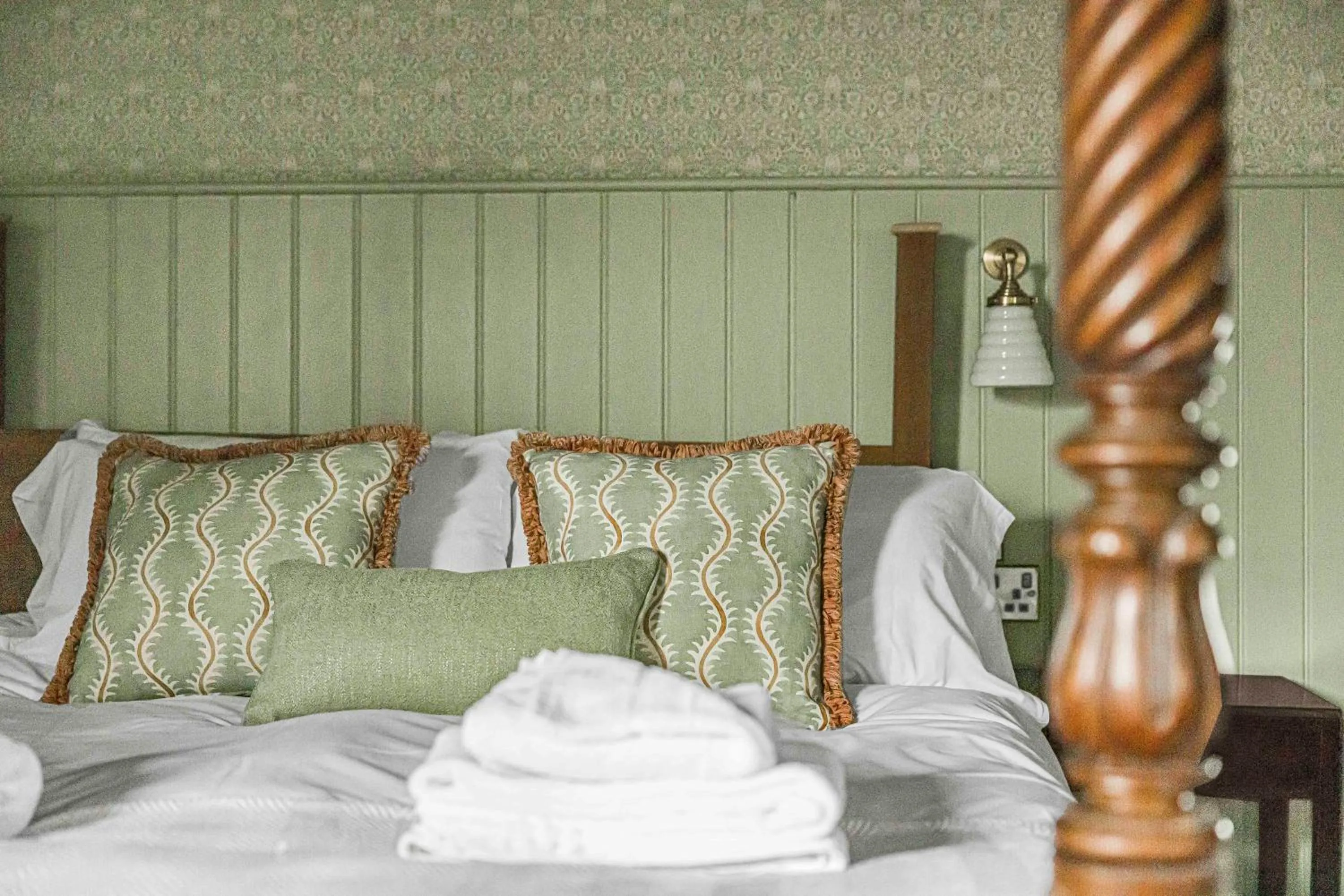 Bed in The Golden Pheasant Inn