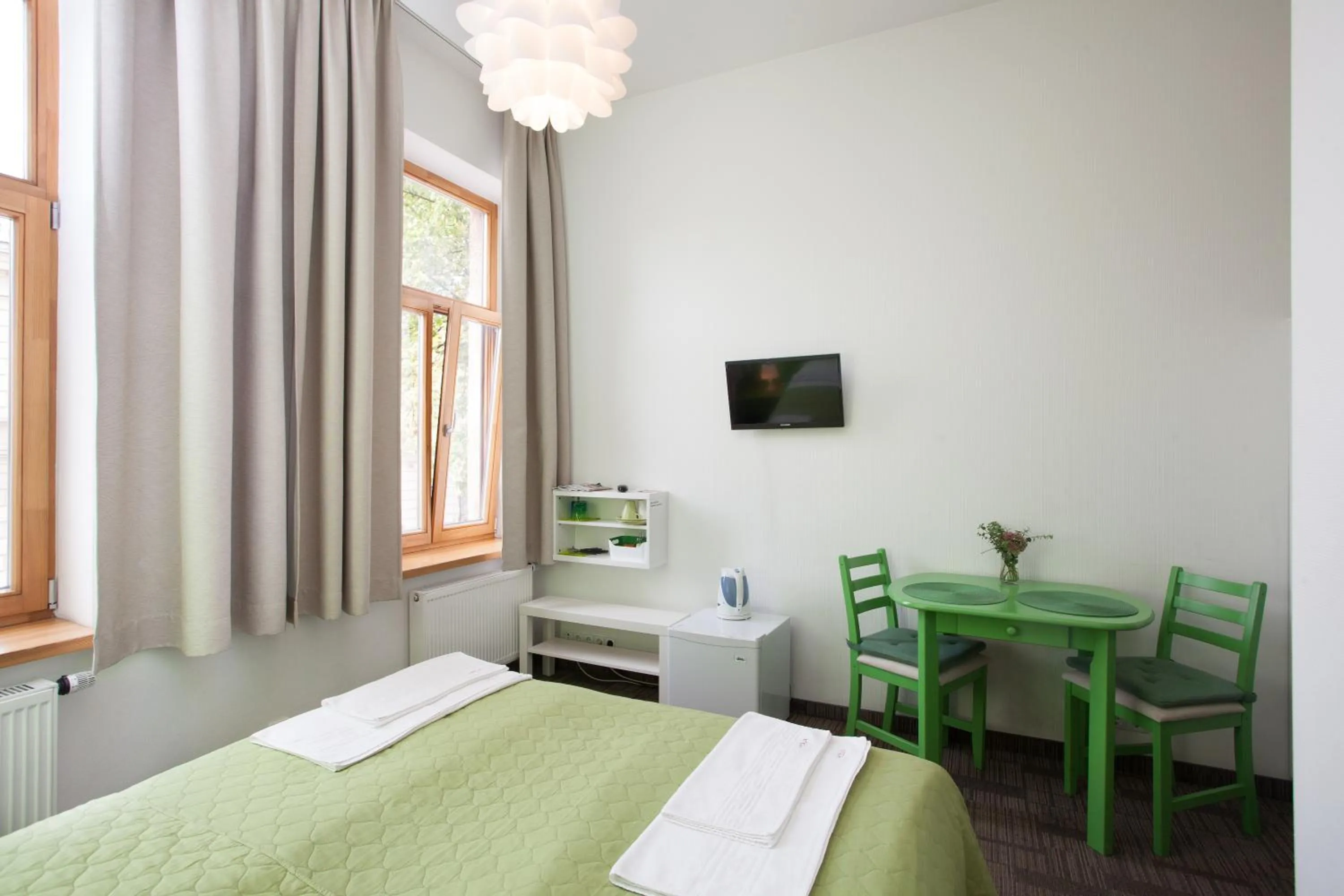 Seating area, Bed in Moja Accommodation