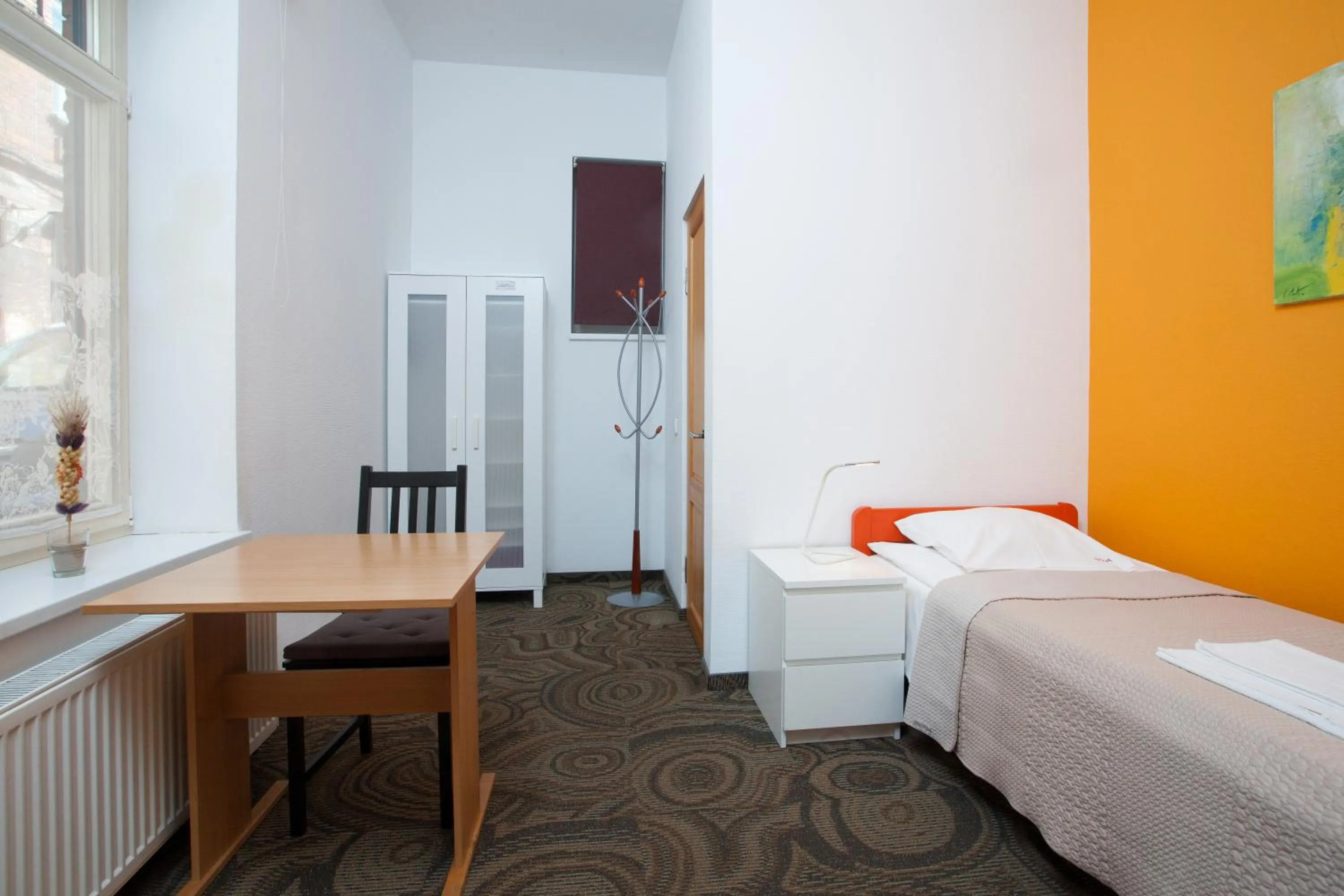 Seating area, Bed in Moja Accommodation