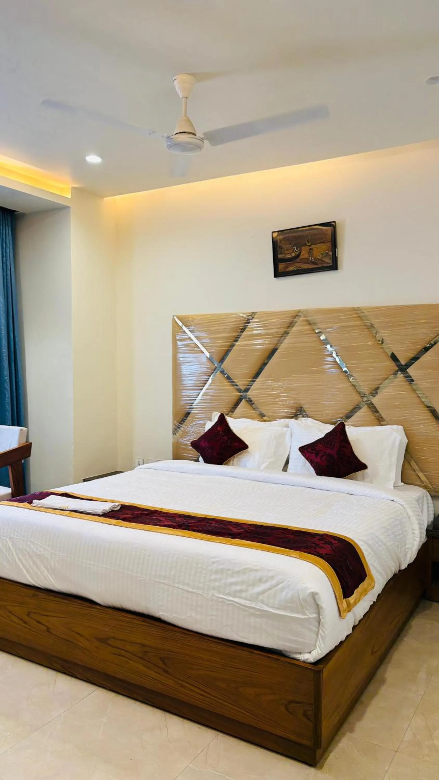 Bedroom in MK Naidu Hotel &Conventions Center