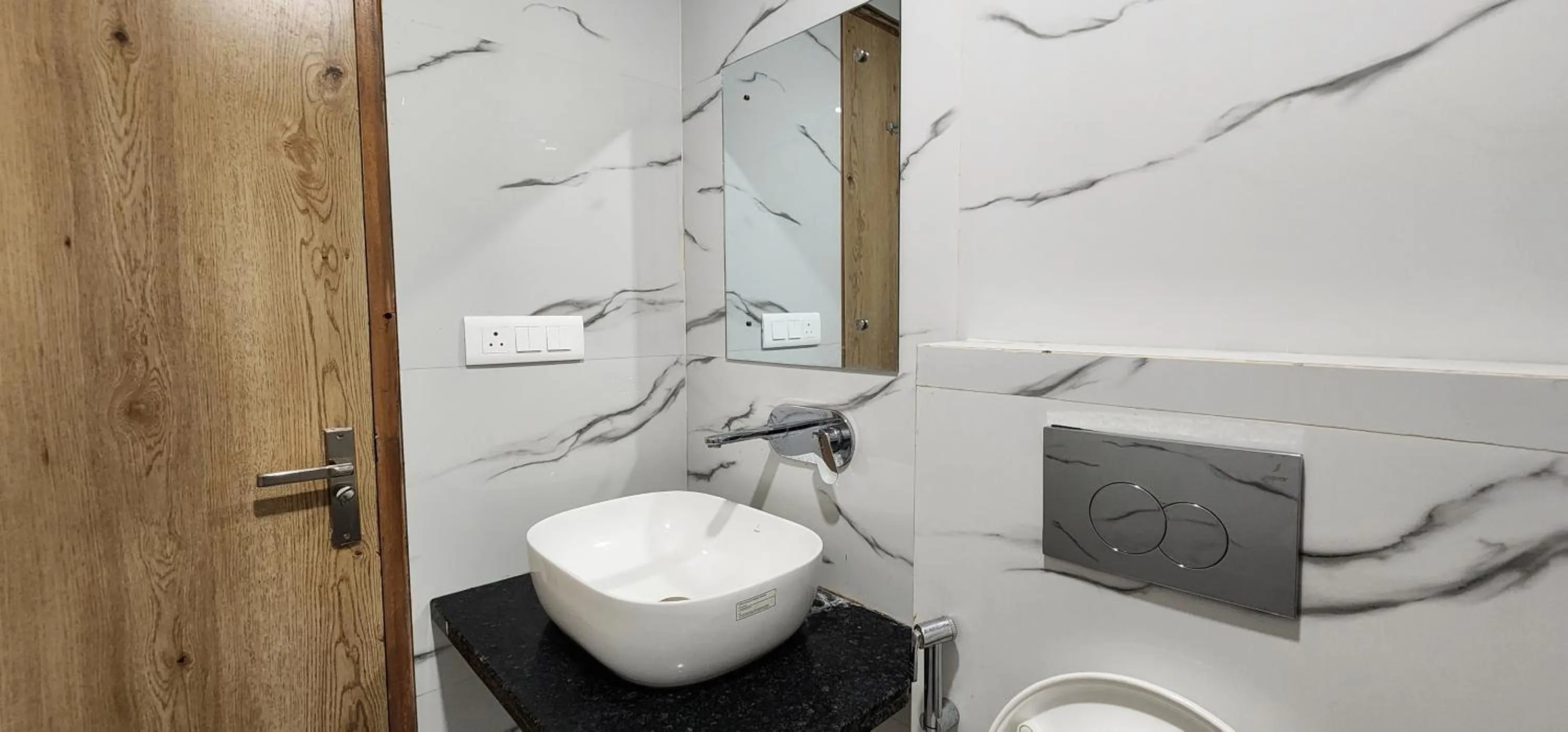 Bathroom in Hotel Shree Sai Dham