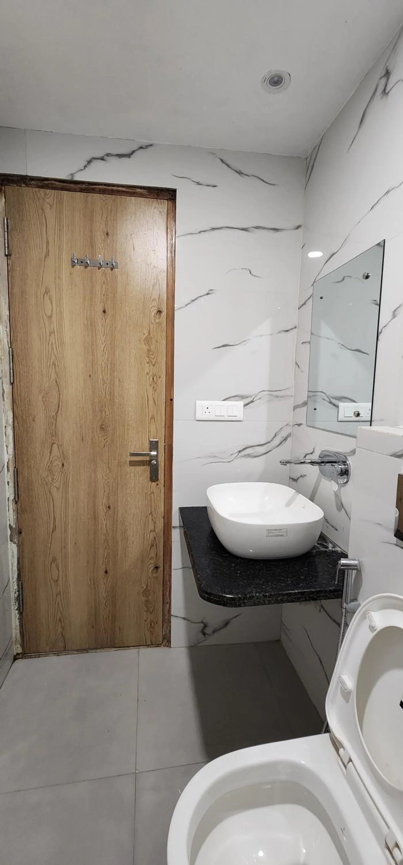 Bathroom in Hotel Shree Sai Dham