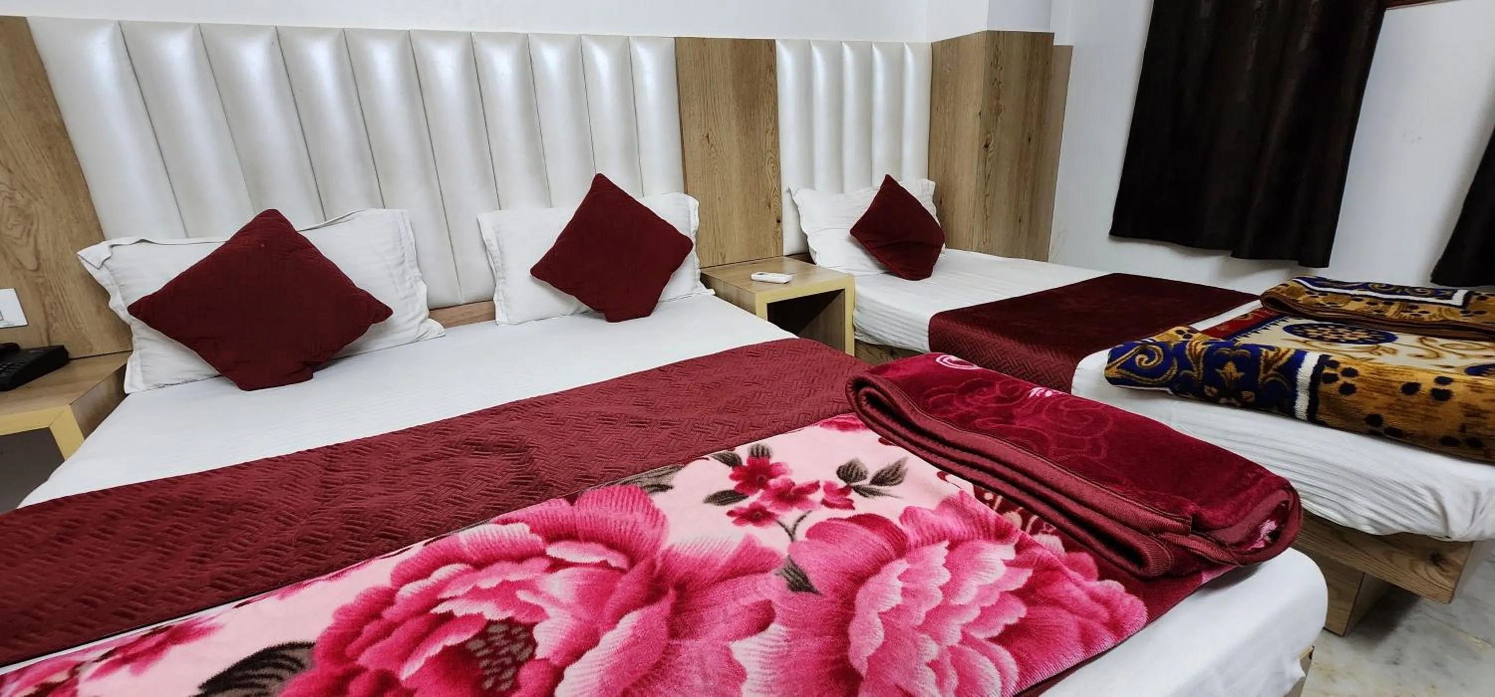 Bed in Hotel Shree Sai Dham