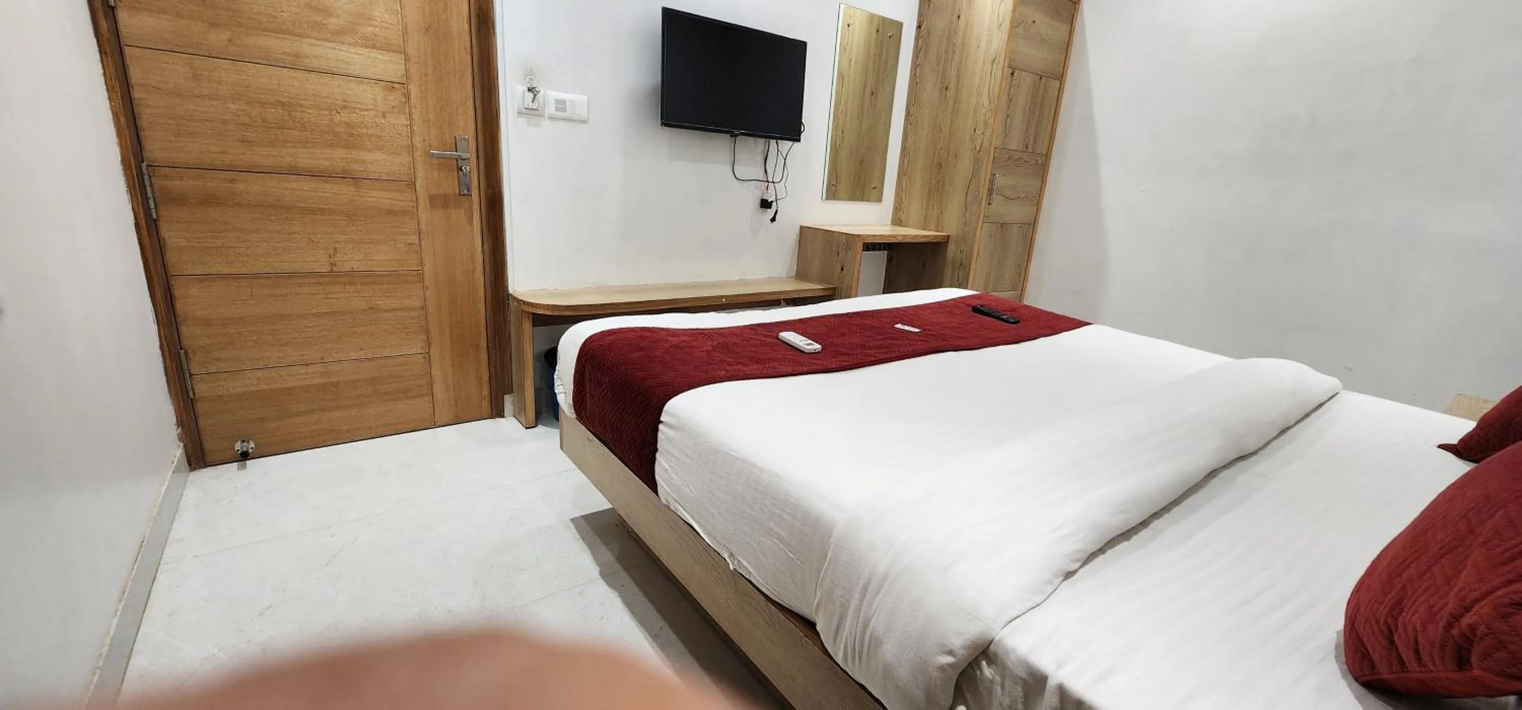 Bed in Hotel Shree Sai Dham