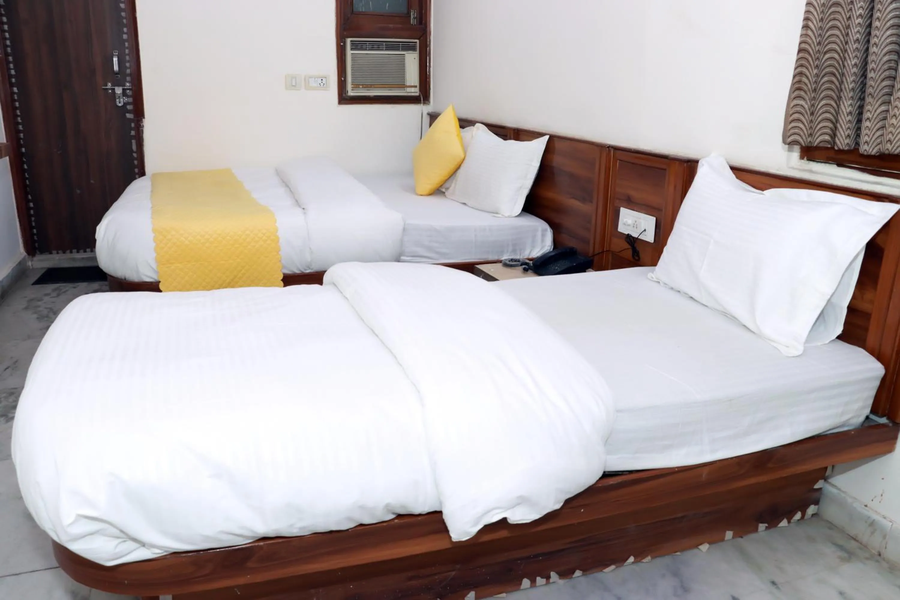 Bed in Hotel Gush At New Delhi Railway Station
