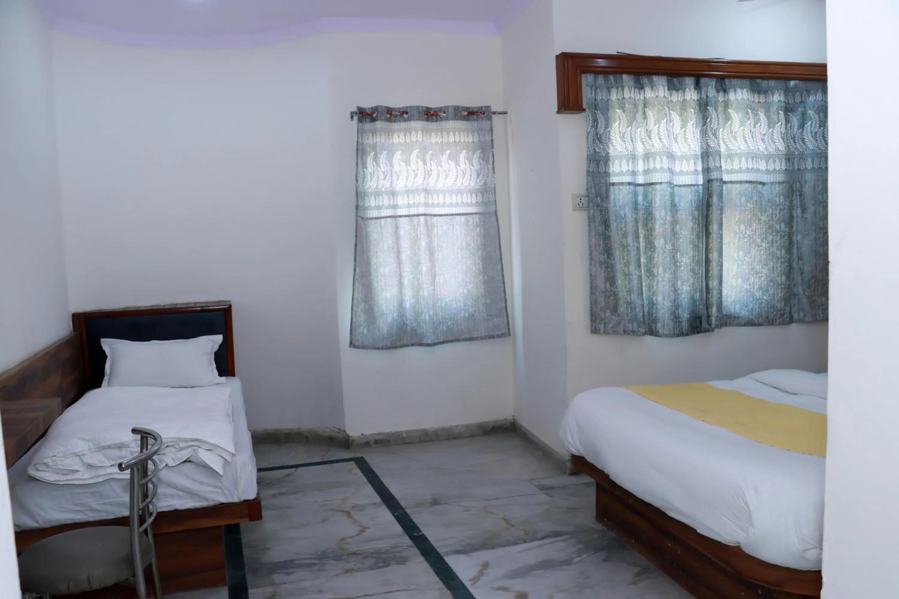 Bed in Hotel Gush At New Delhi Railway Station