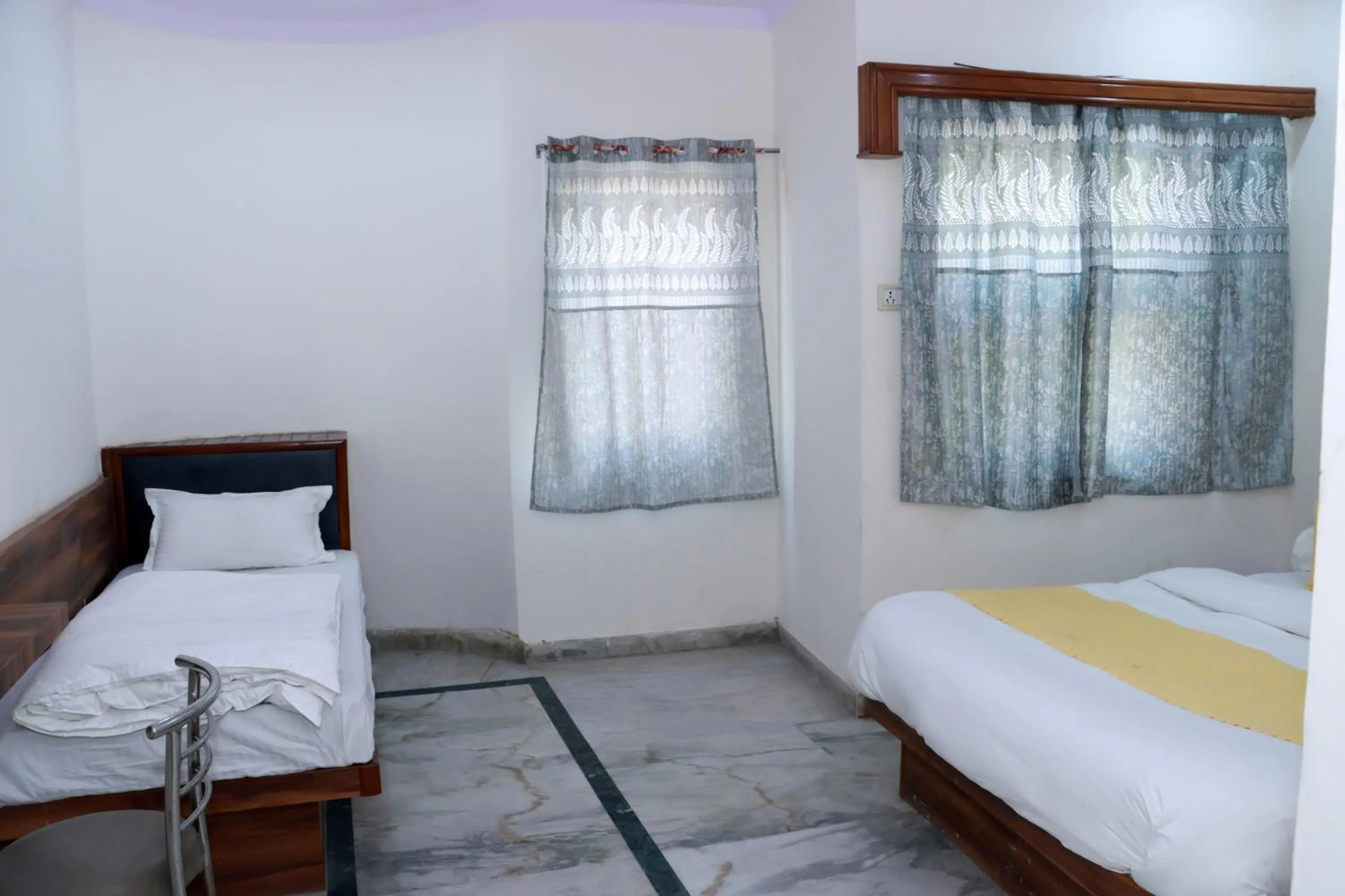 Bed in Hotel Gush At New Delhi Railway Station