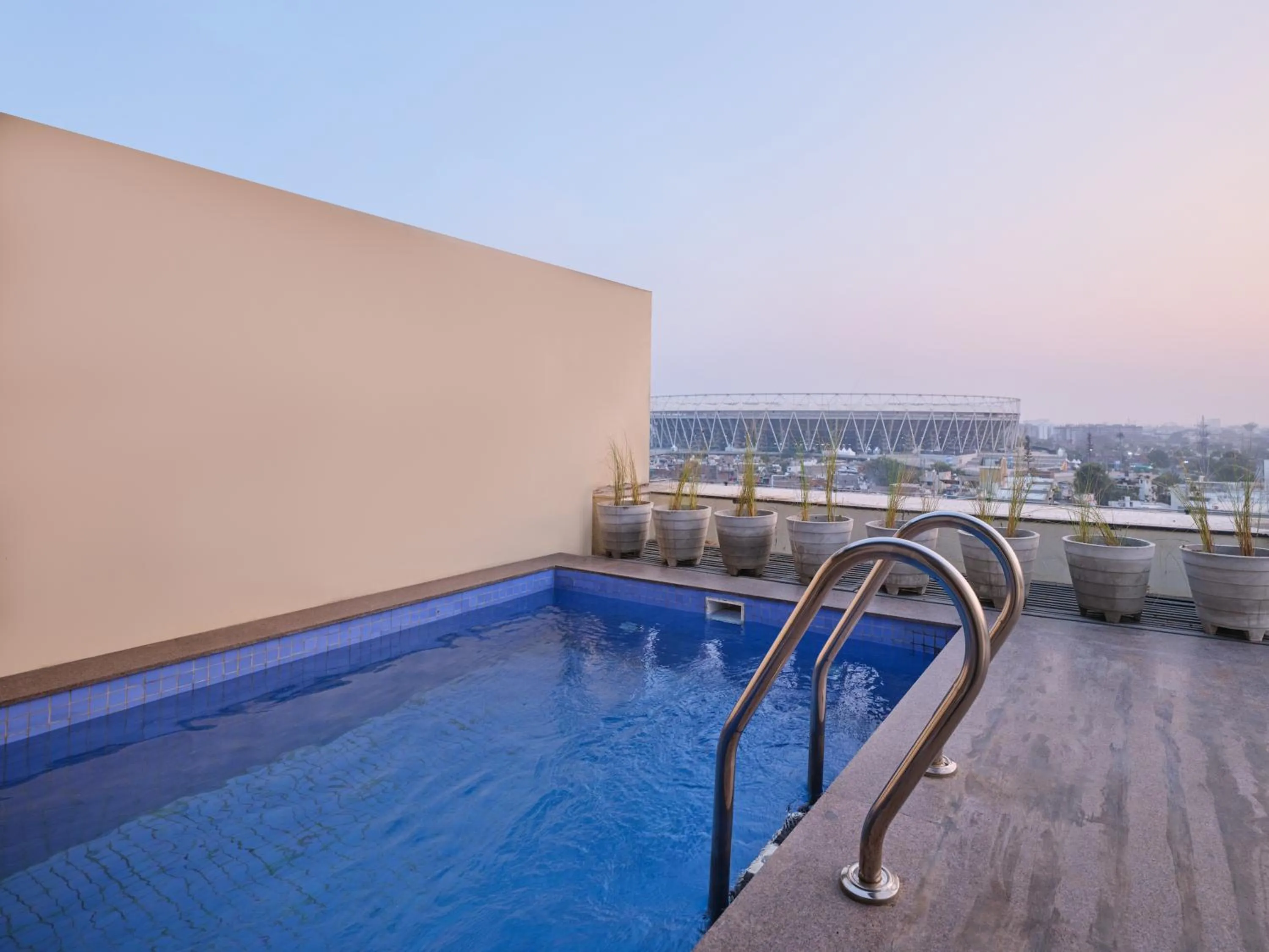 Swimming pool in Biznotel By Pride Motera