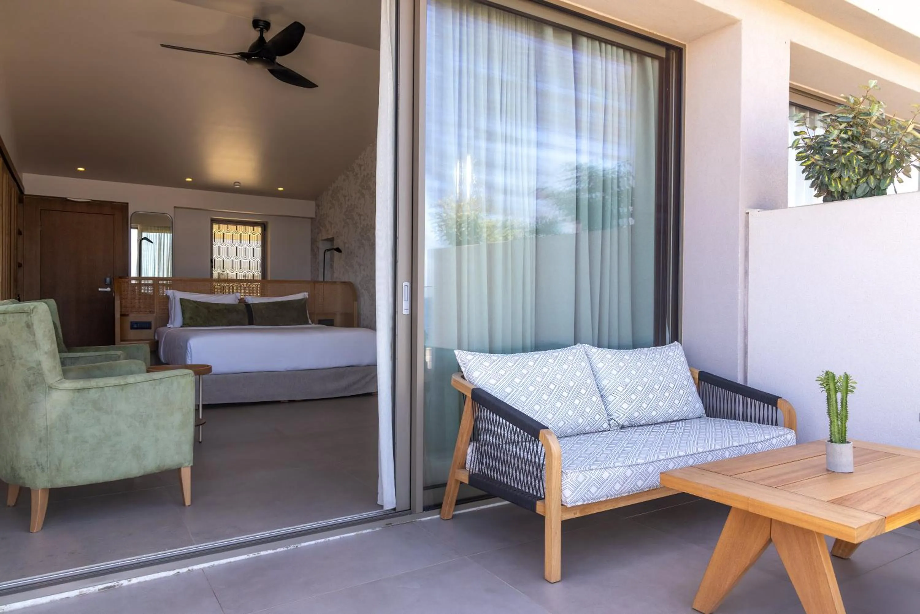 Balcony/Terrace, Bed in Castello Boutique Suites by the sea - Adults Only