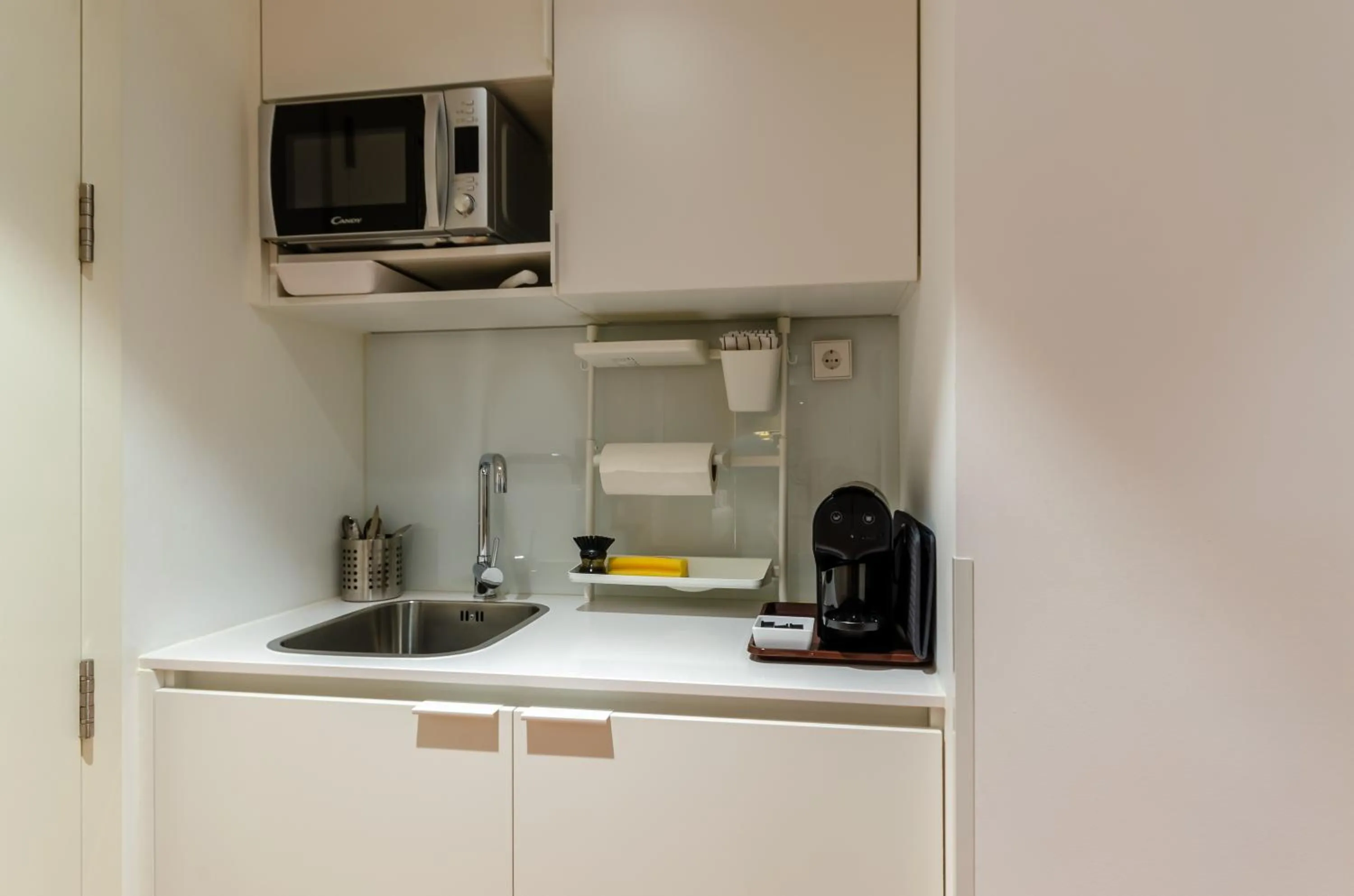 Kitchen or kitchenette in The 7 Hotel, Suites, Studios & Apartments