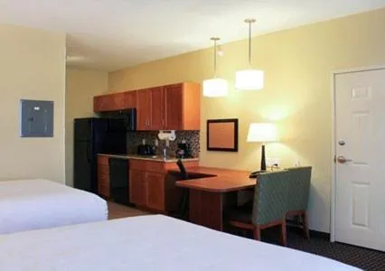 Photo of the whole room, Bed in MainStay Suites Tioga