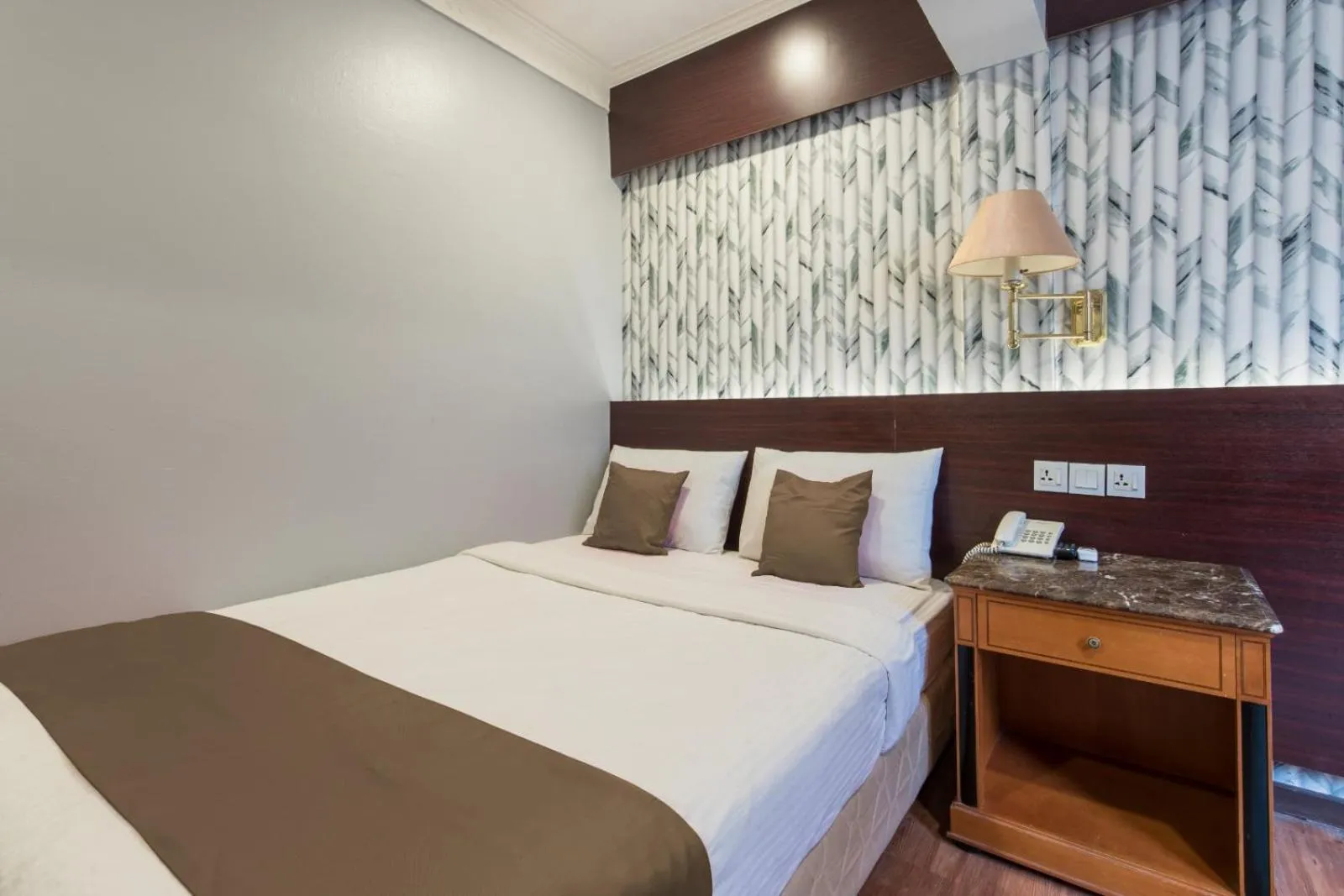 Bed in Hotel grand orchard