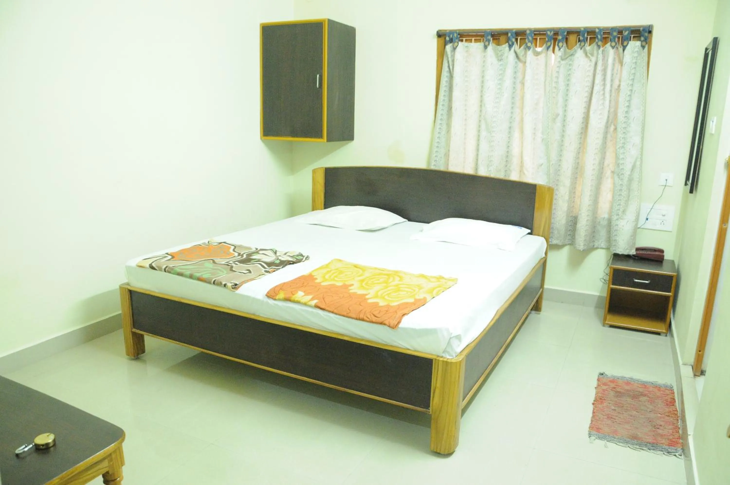 Bed in Hotel Agarala Residency