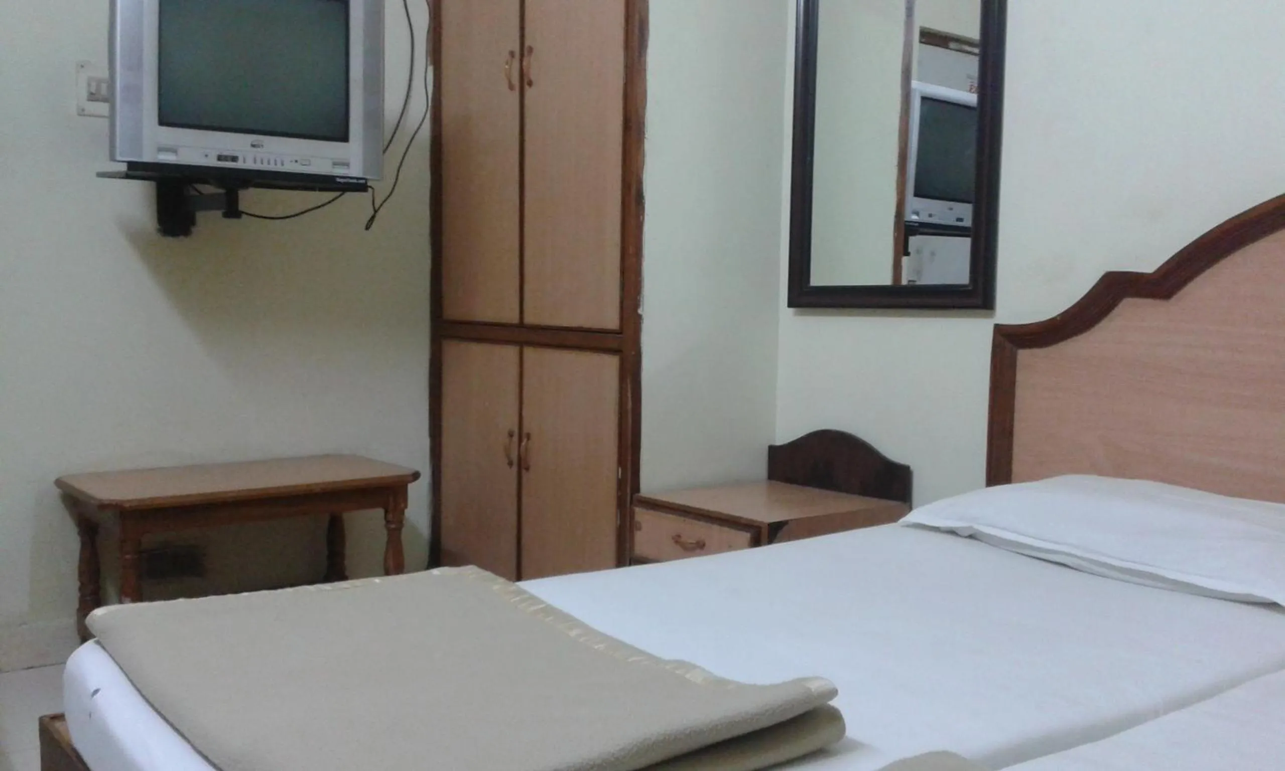 Bed in Hotel Agarala Residency