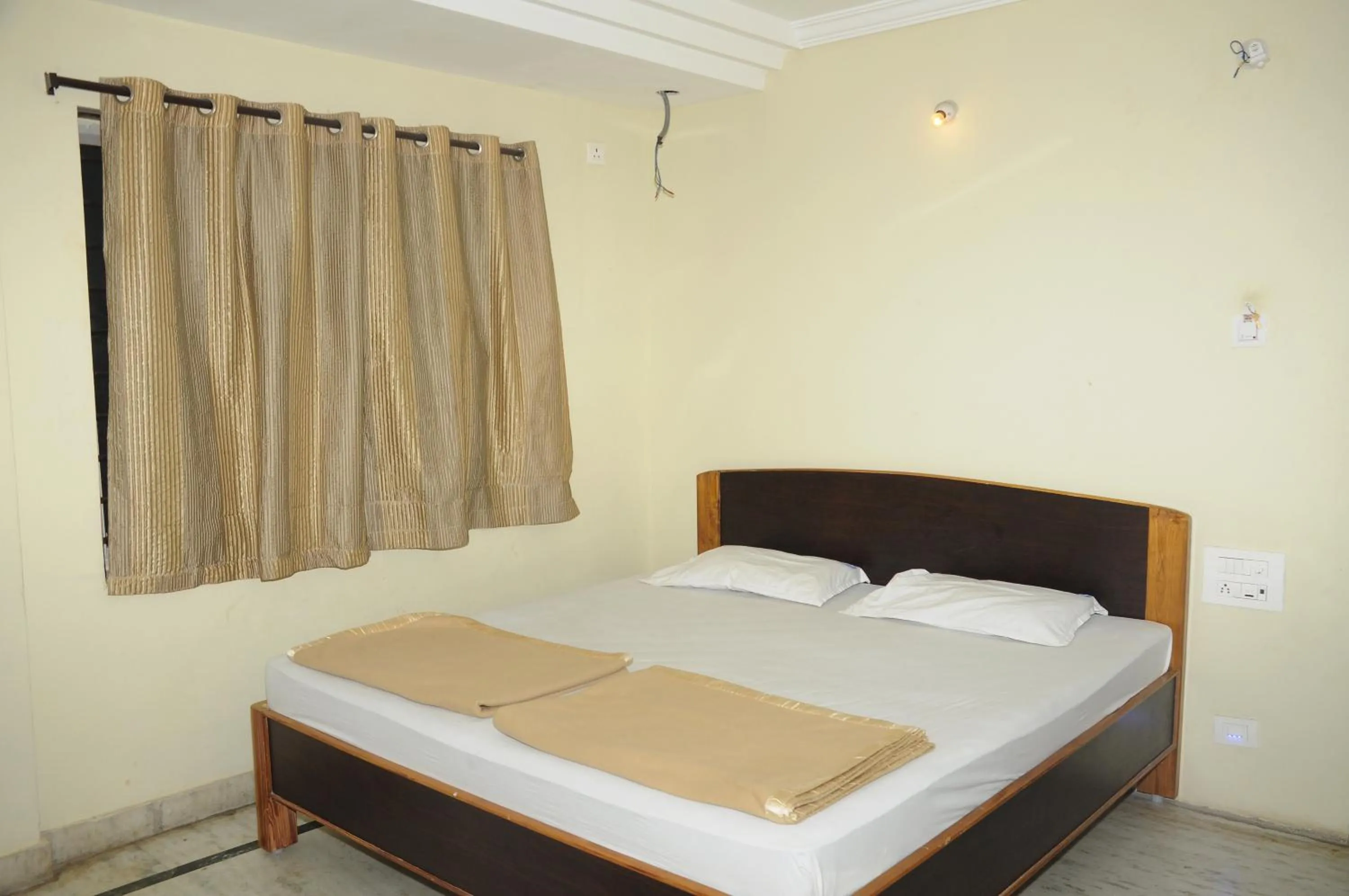 Bed in Hotel Agarala Residency