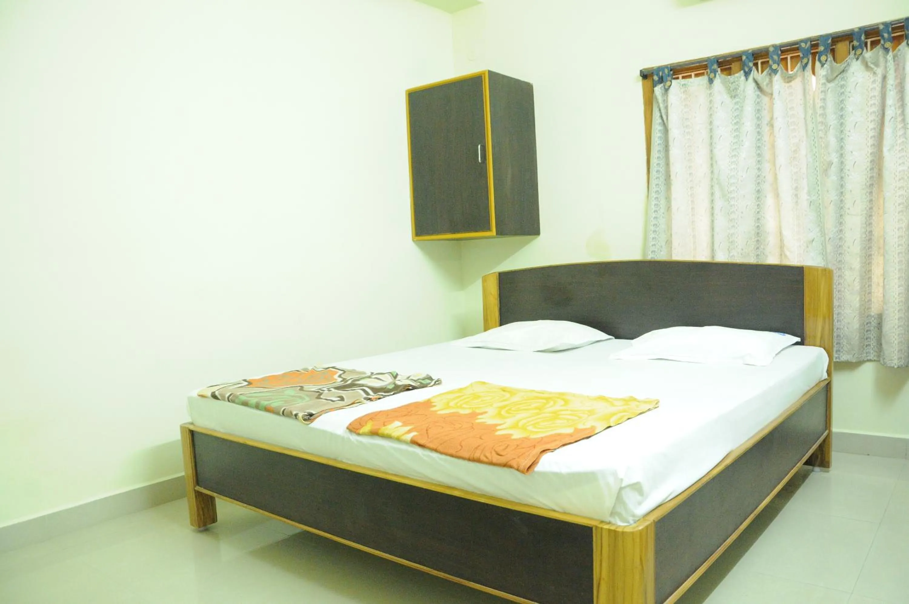 Bed in Hotel Agarala Residency