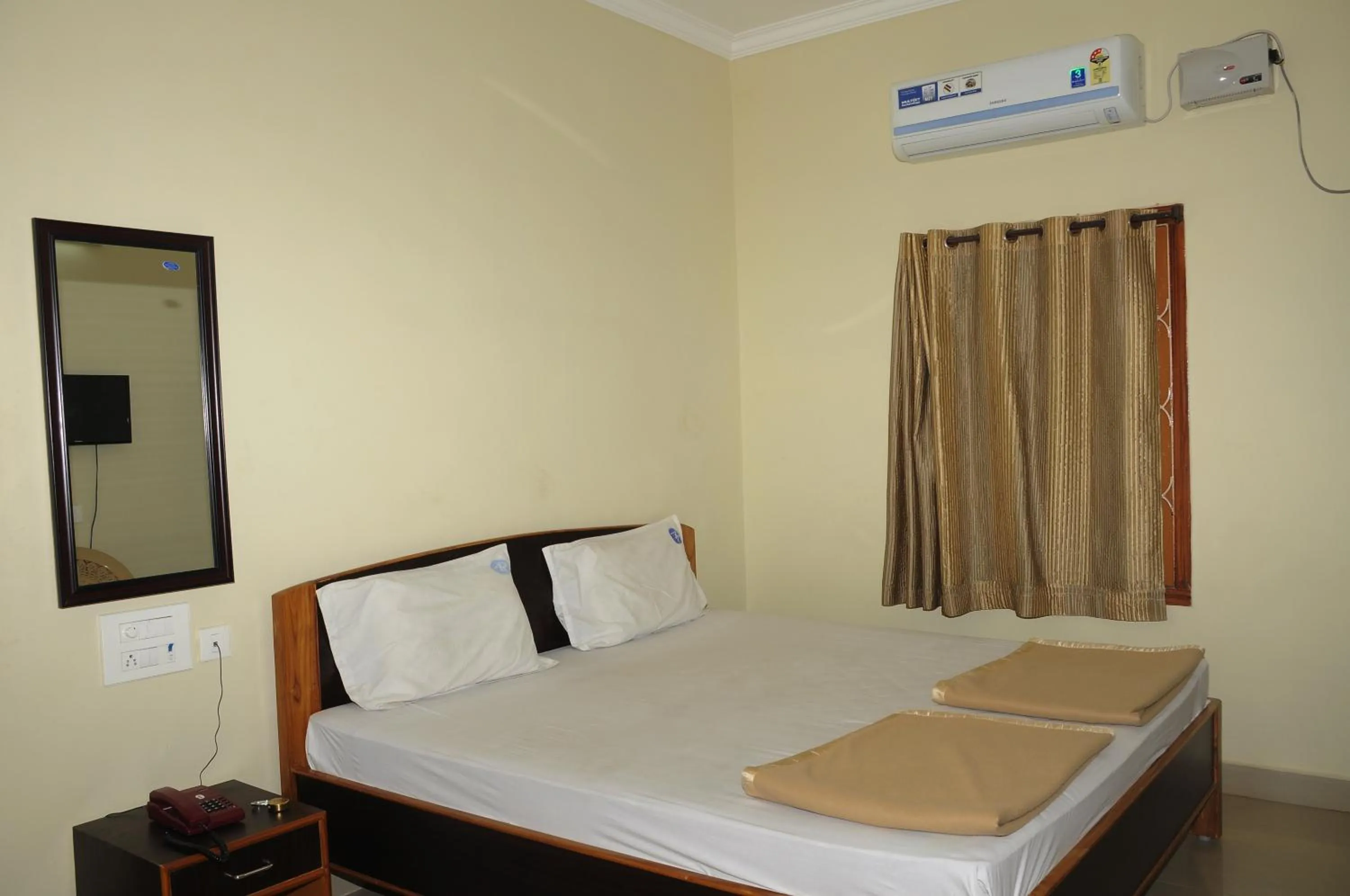 Bed in Hotel Agarala Residency