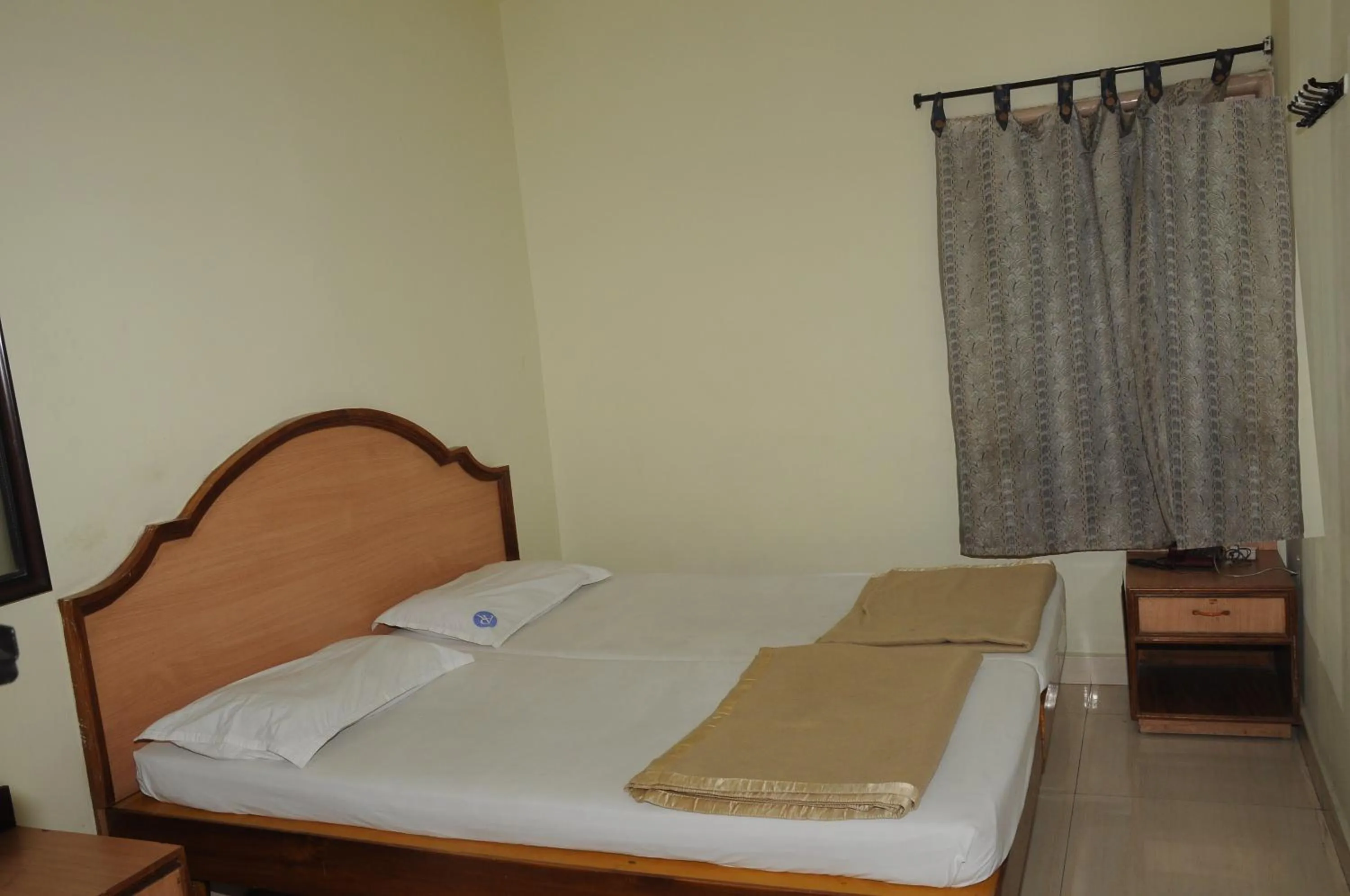 Bed in Hotel Agarala Residency