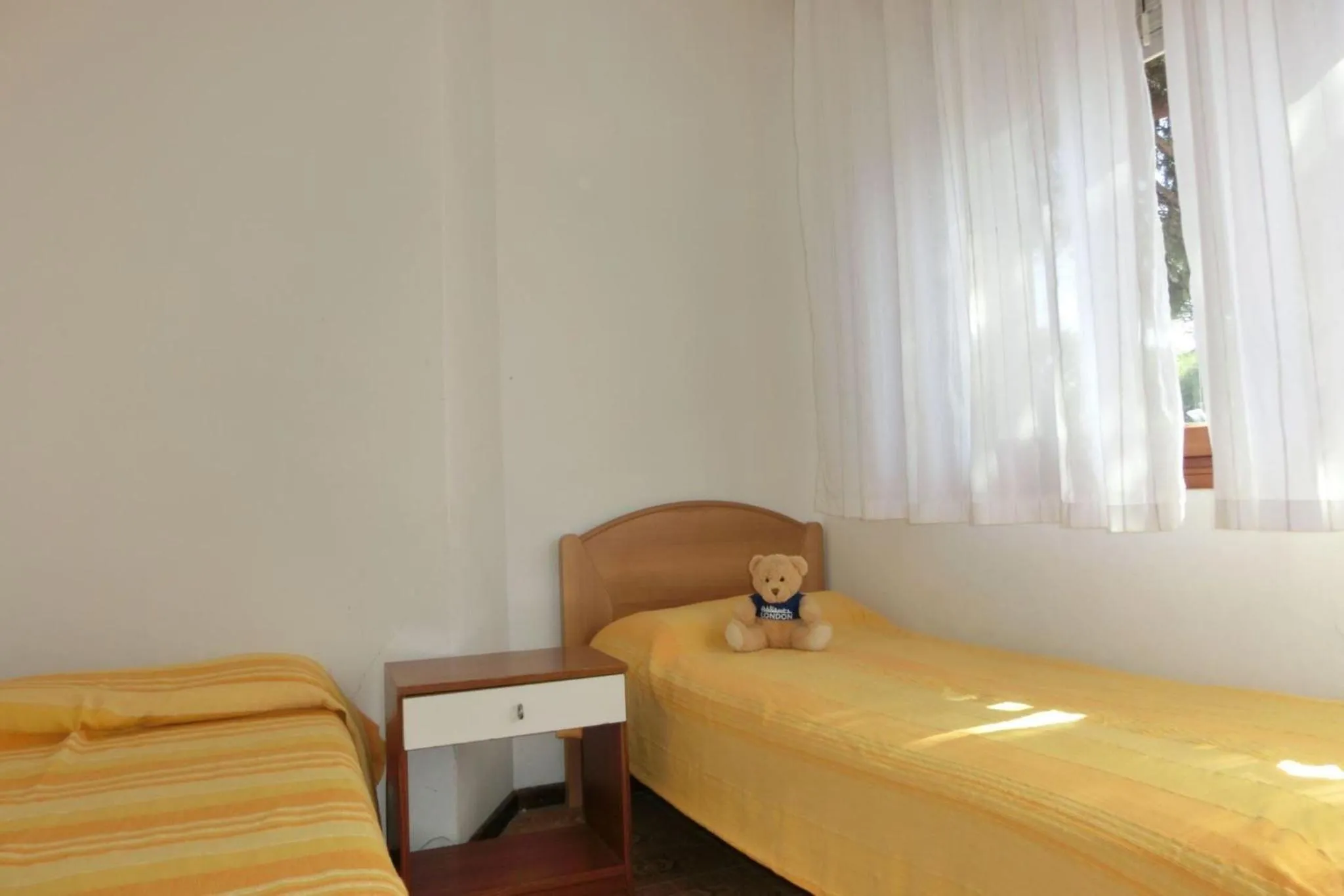 Bed in Bright flat close to Bibione promenade