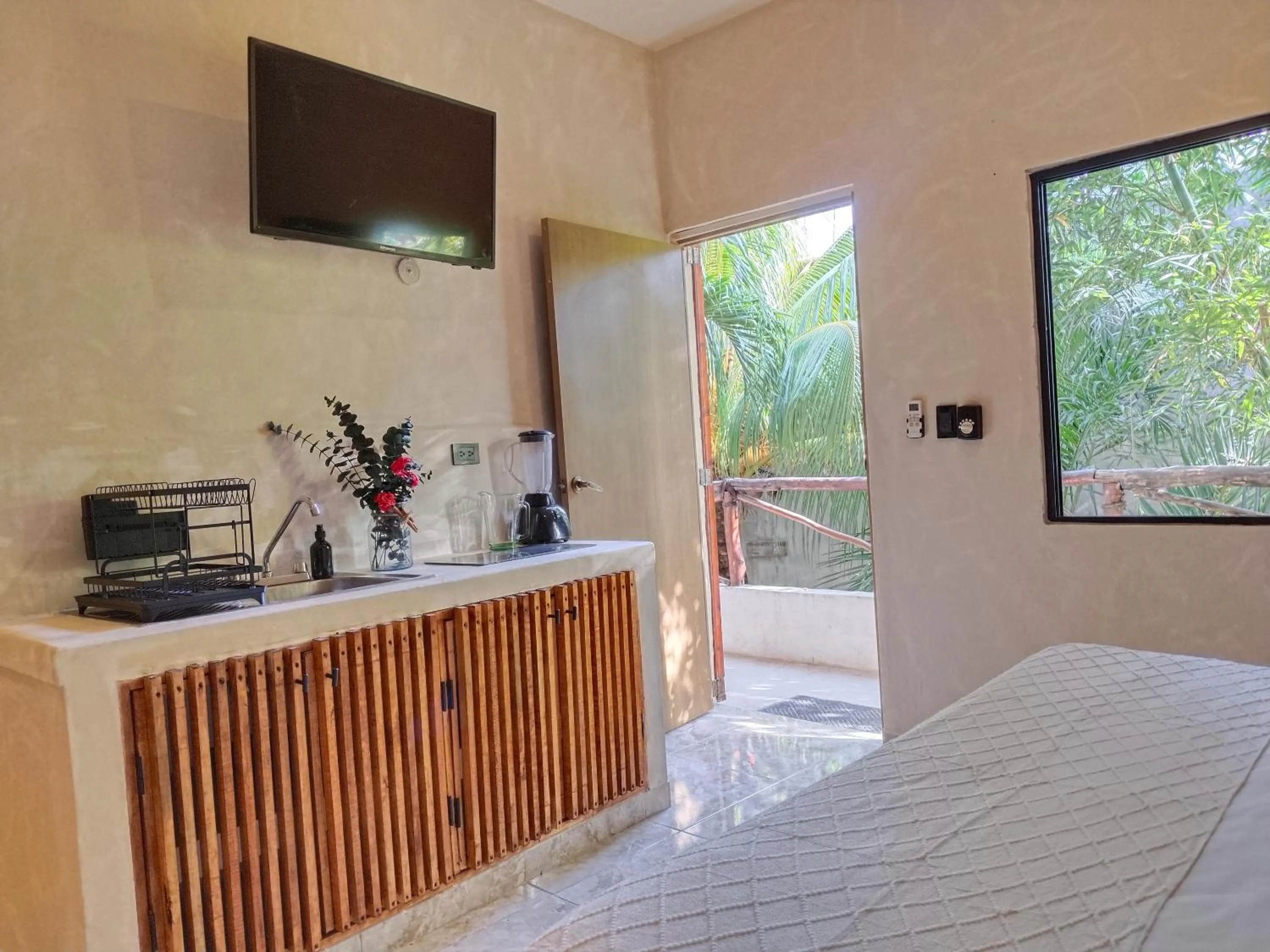 Kitchen or kitchenette, Bed in Casa Lupita