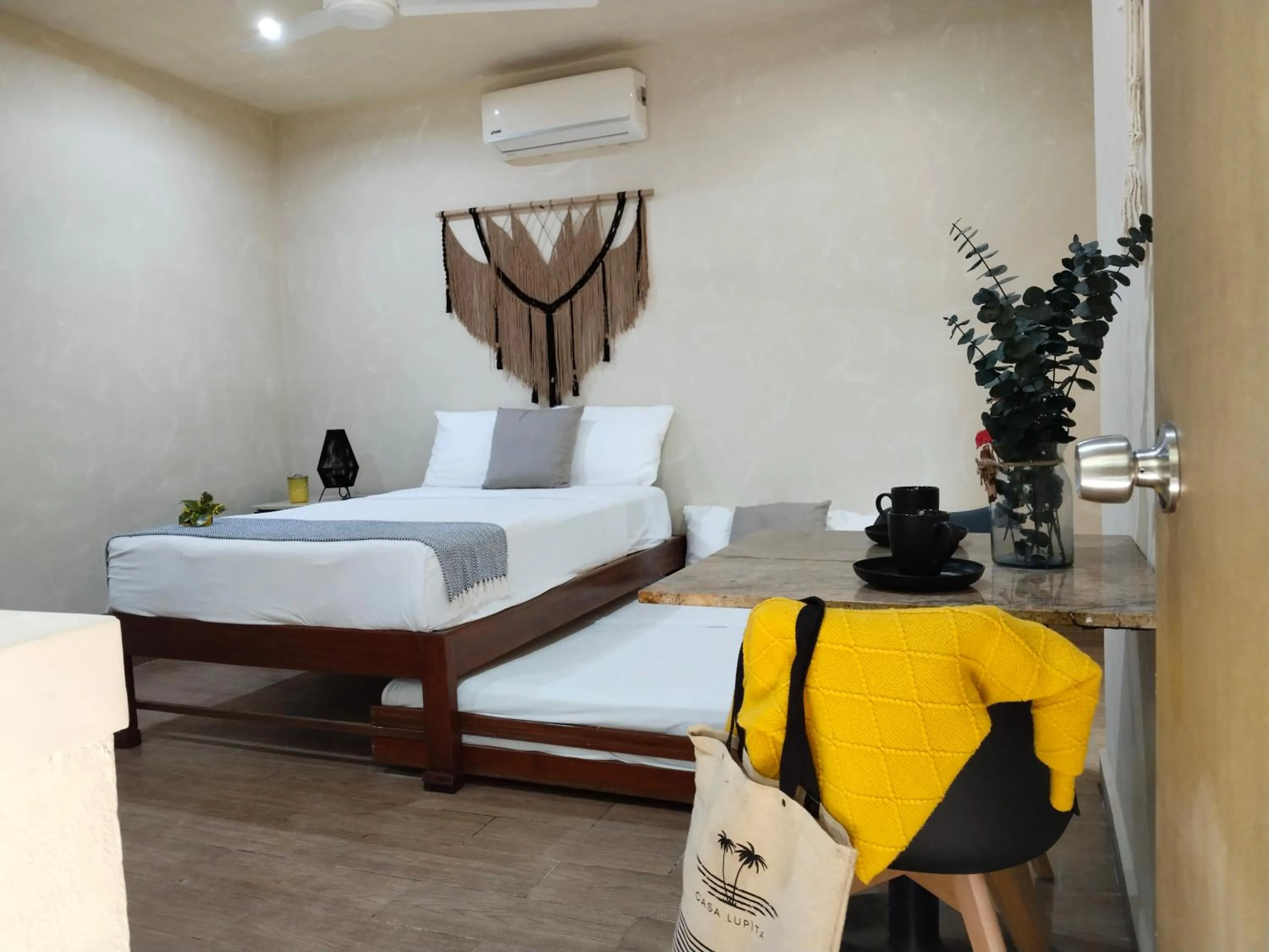 Photo of the whole room, Bed in Casa Lupita