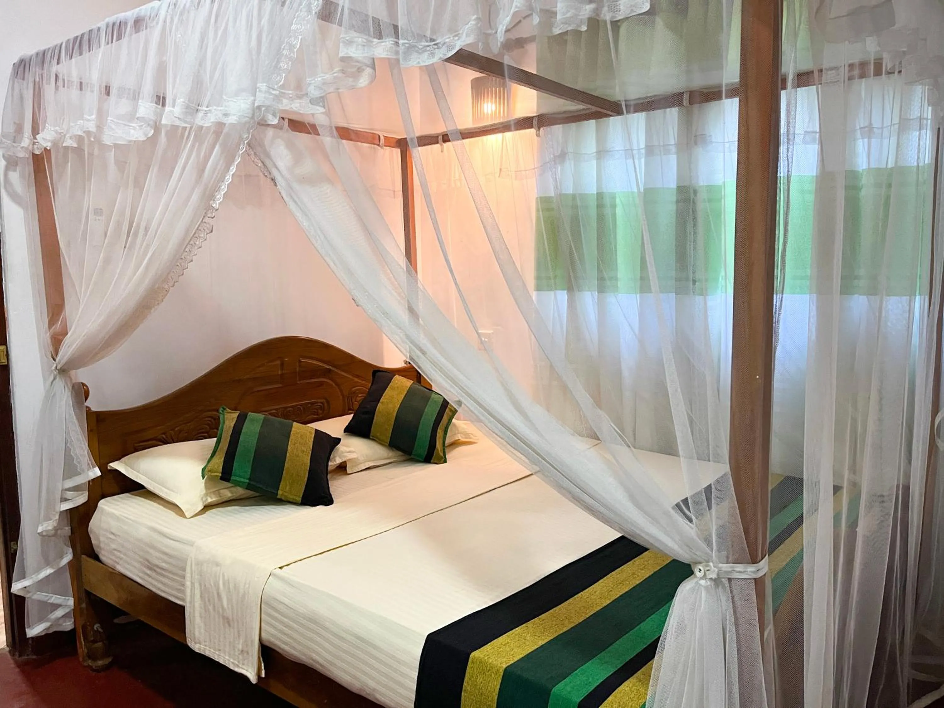 Bed in Damith Tourist Inn