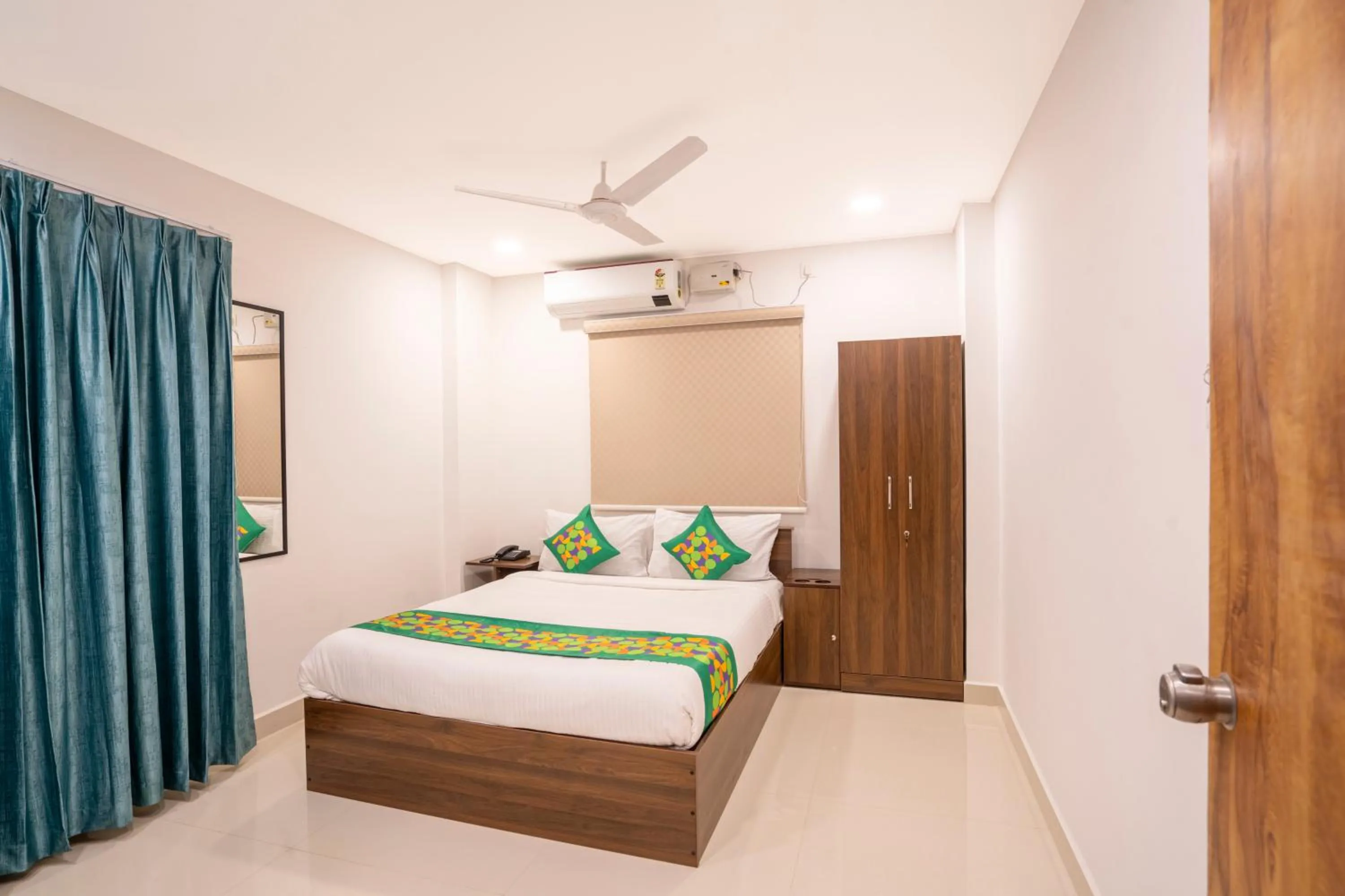 Bedroom, Bed in Treebo De Alphabet Gachibowli