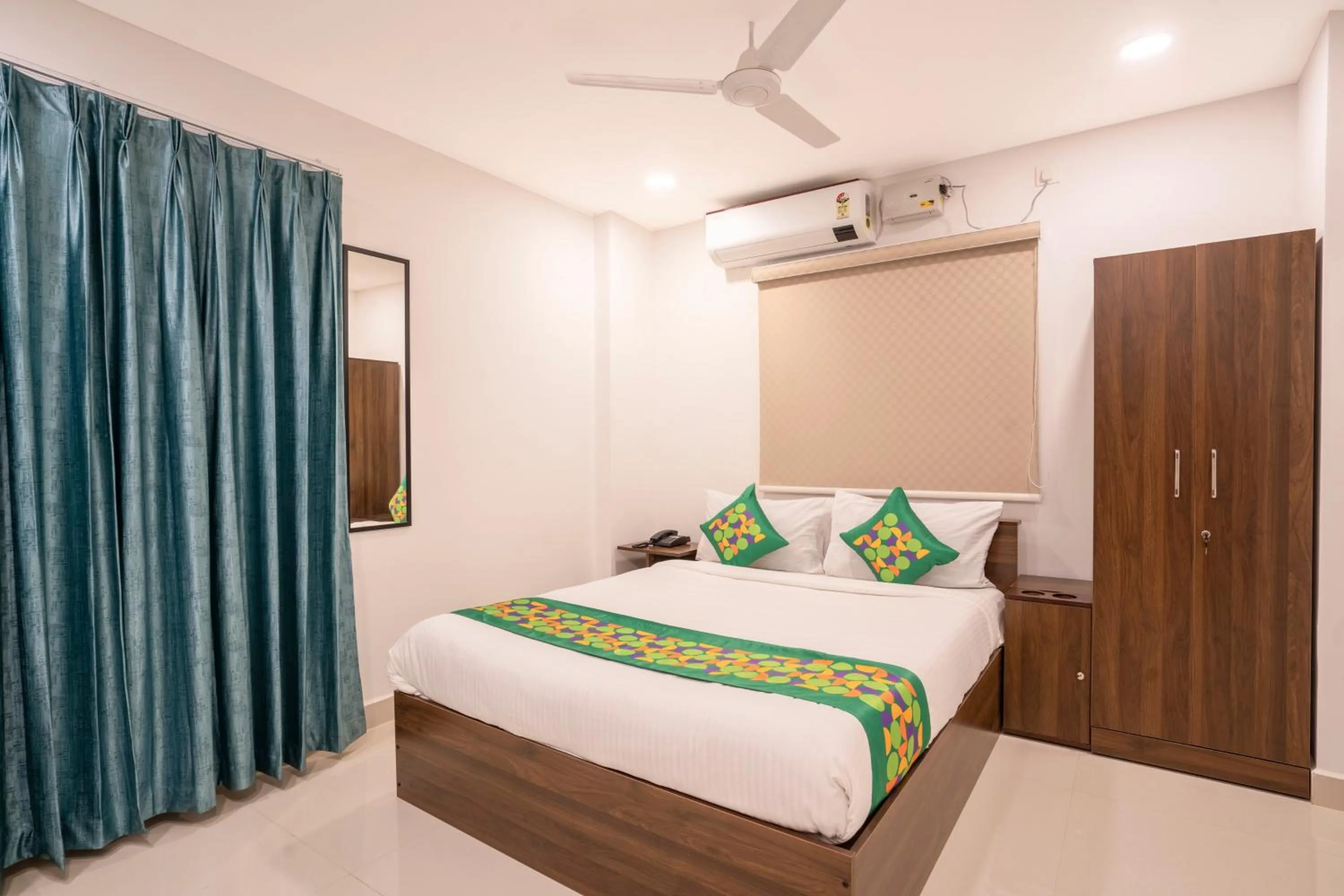 Bedroom, Bed in Treebo De Alphabet Gachibowli