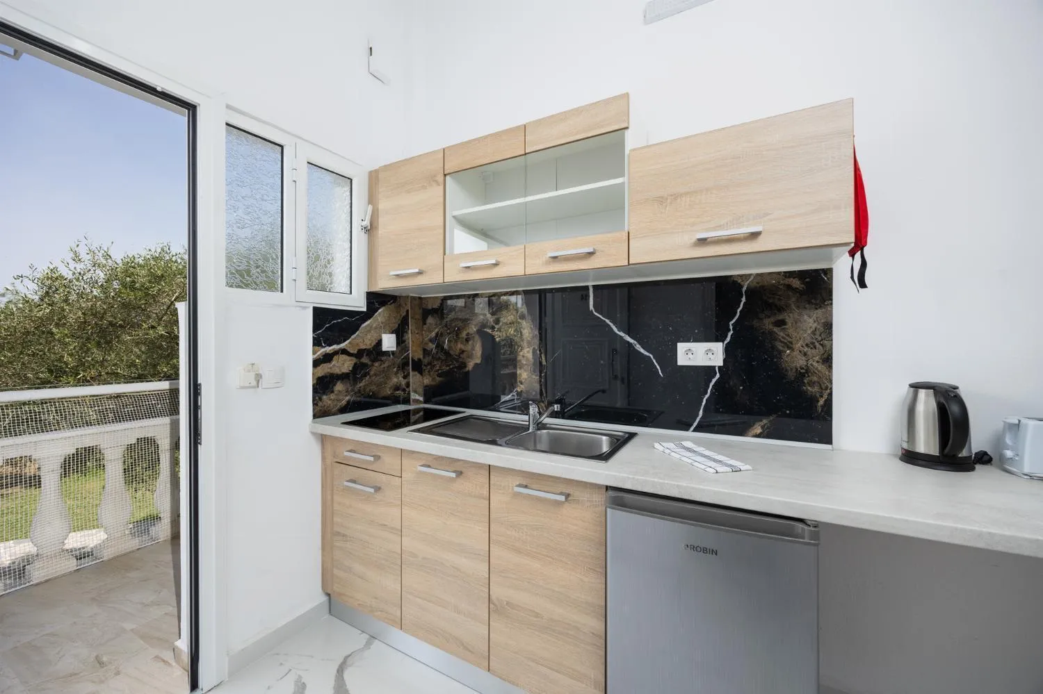 Kitchen or kitchenette in Kosmas Apartments