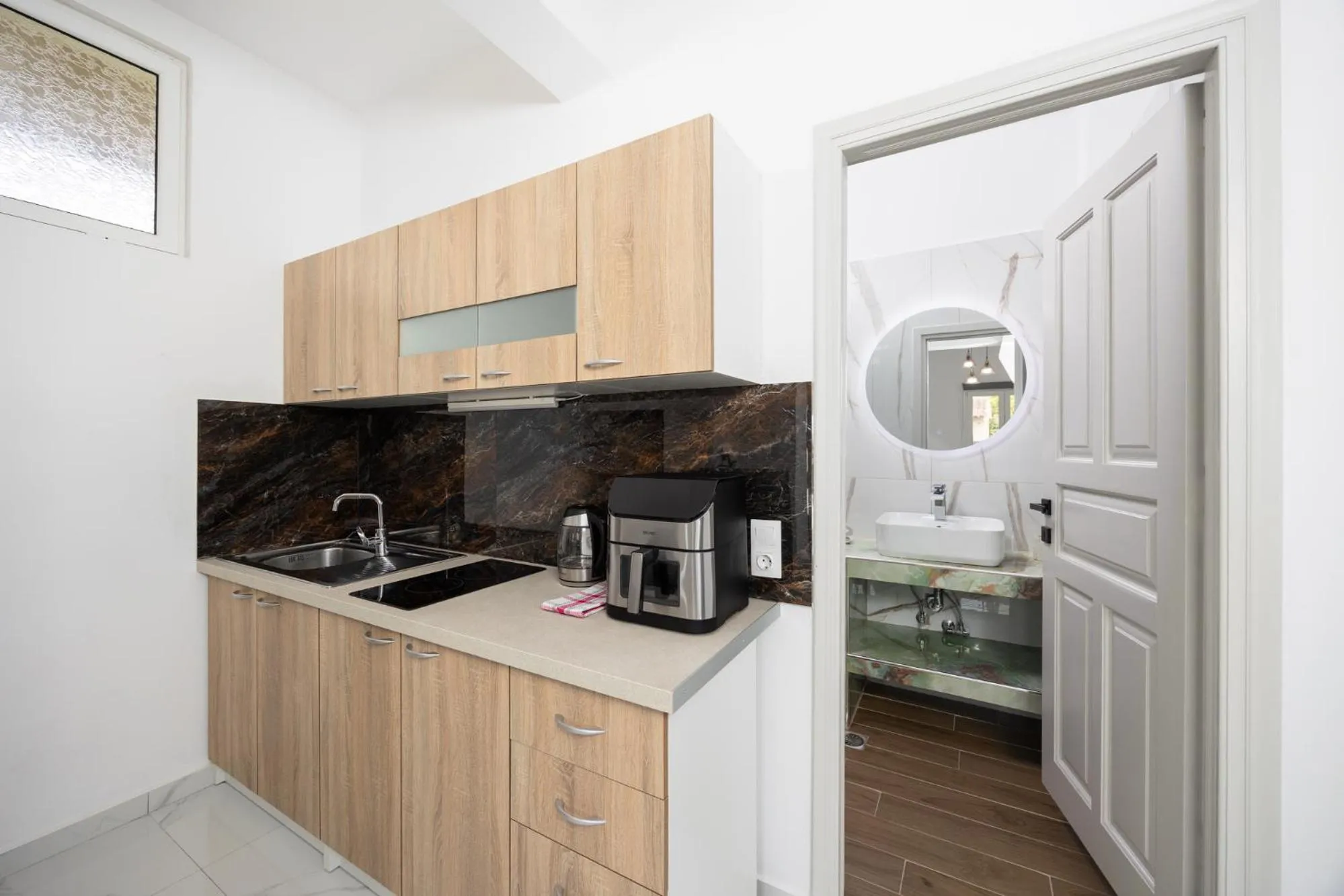 Kitchen or kitchenette in Kosmas Apartments