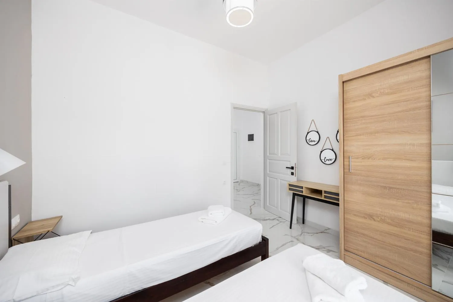 Bed in Kosmas Apartments
