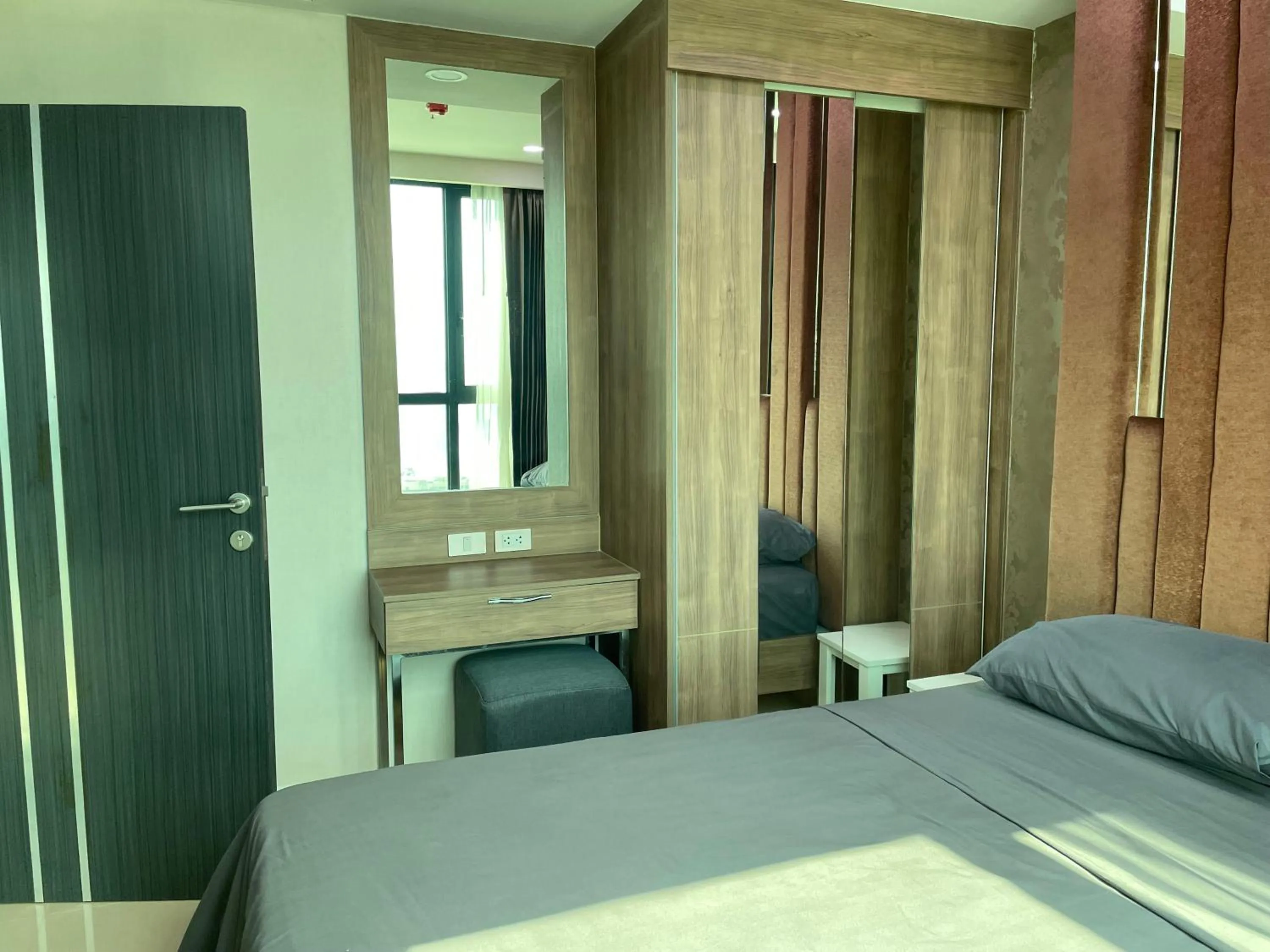 Bed in Dusit Grand Condo View