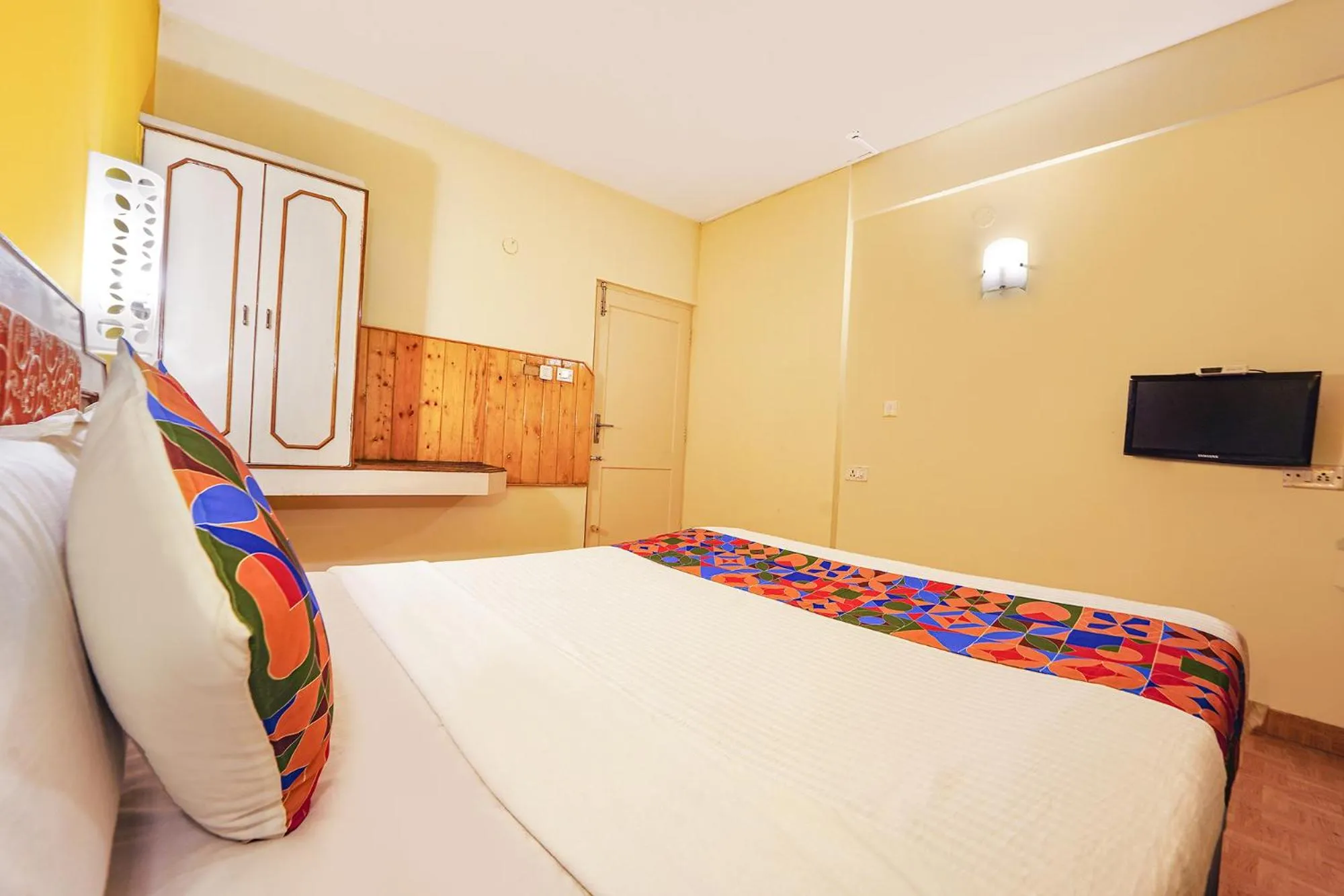 Bed in FabHotel JS Heritage