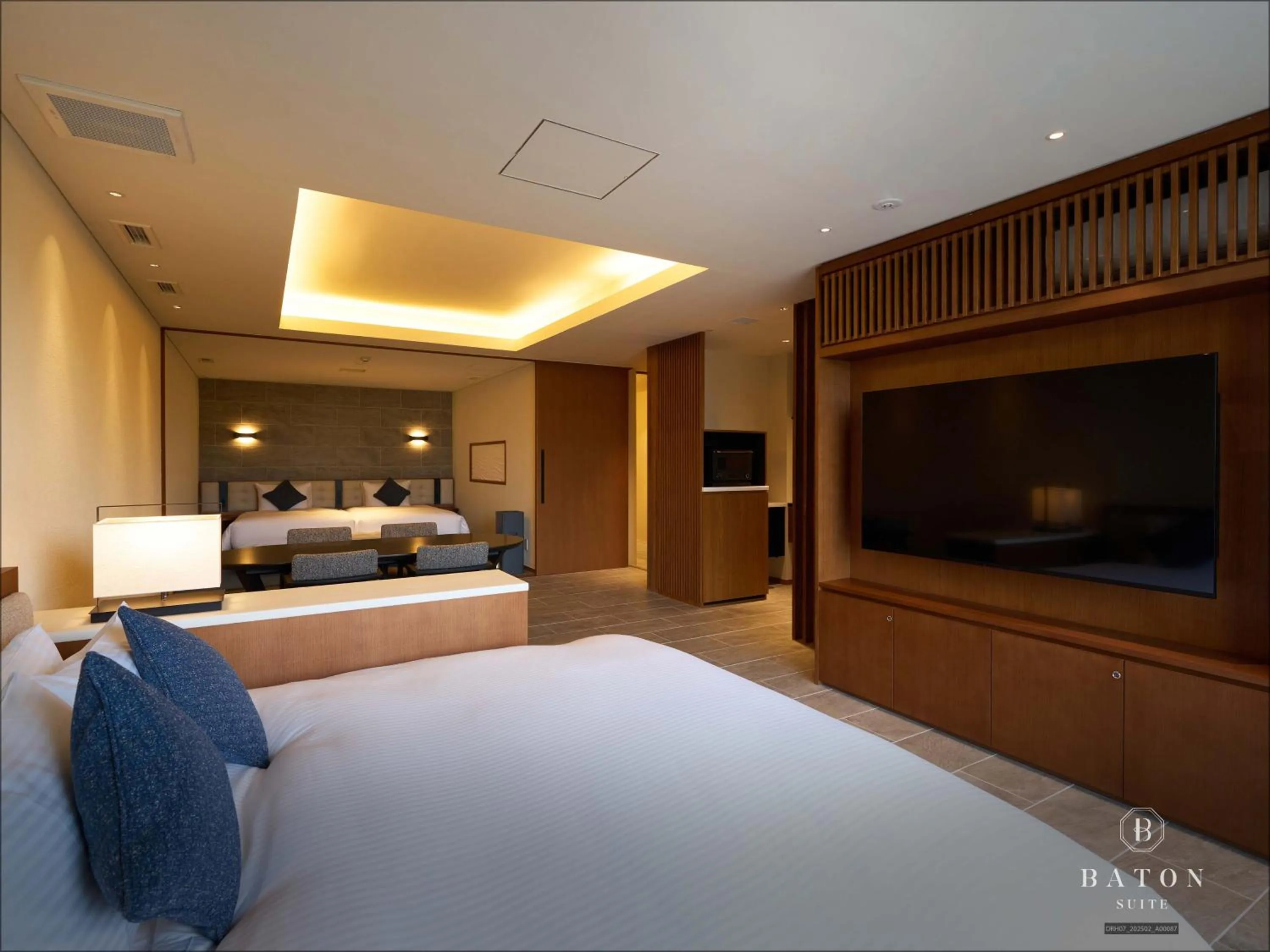 Living room, Bed in BATON SUITE Okinawa-kourijima