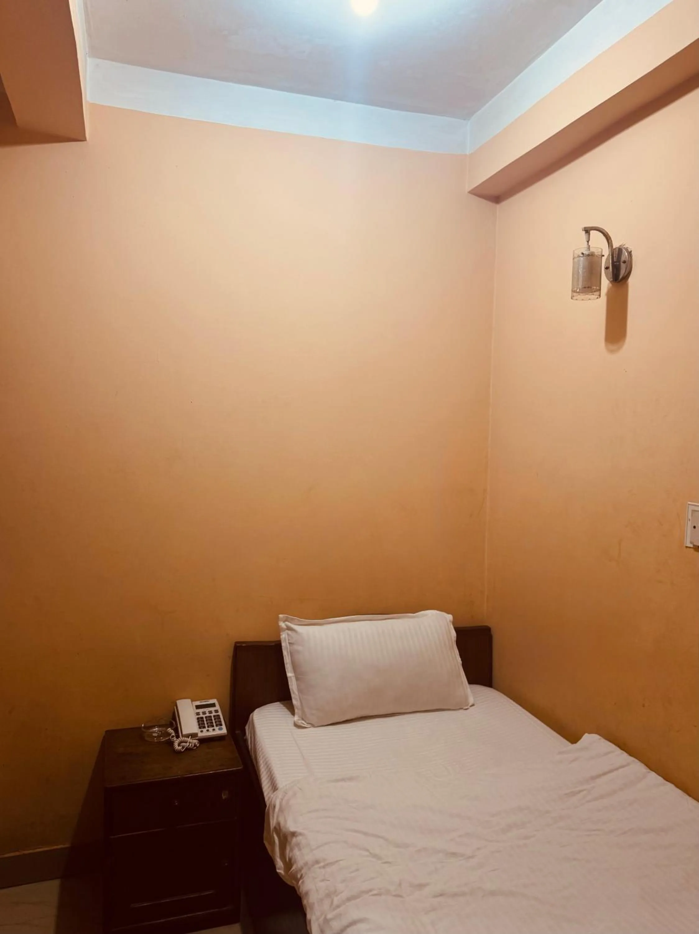 Bed in Om Mandakini Hotel