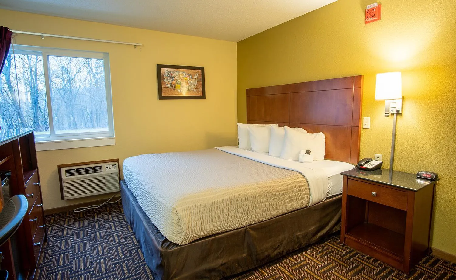 Bedroom, Bed in Coratel Inn and Suites By Jasper River Falls