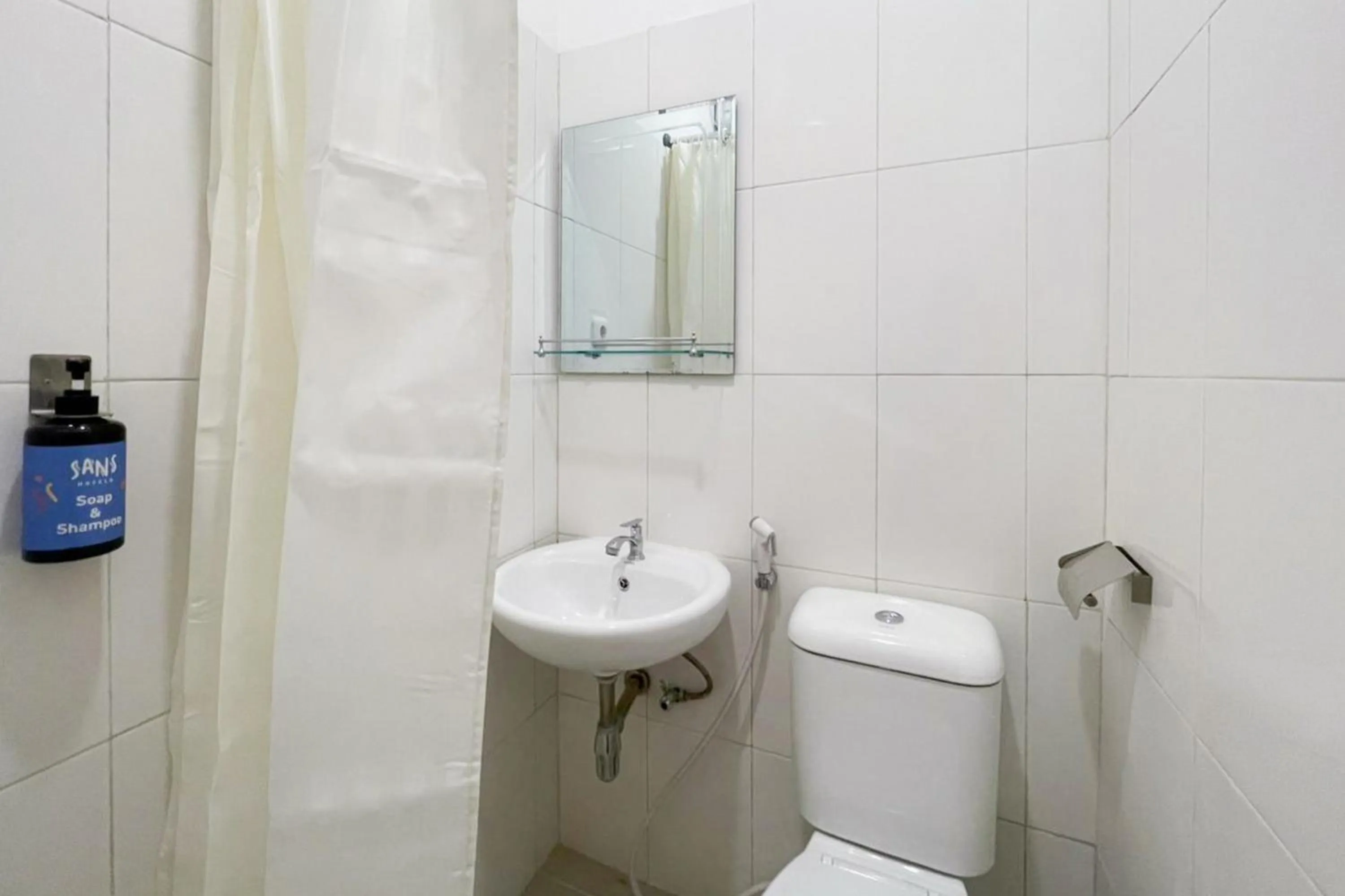 Bathroom in Sans Hotel Cengkareng