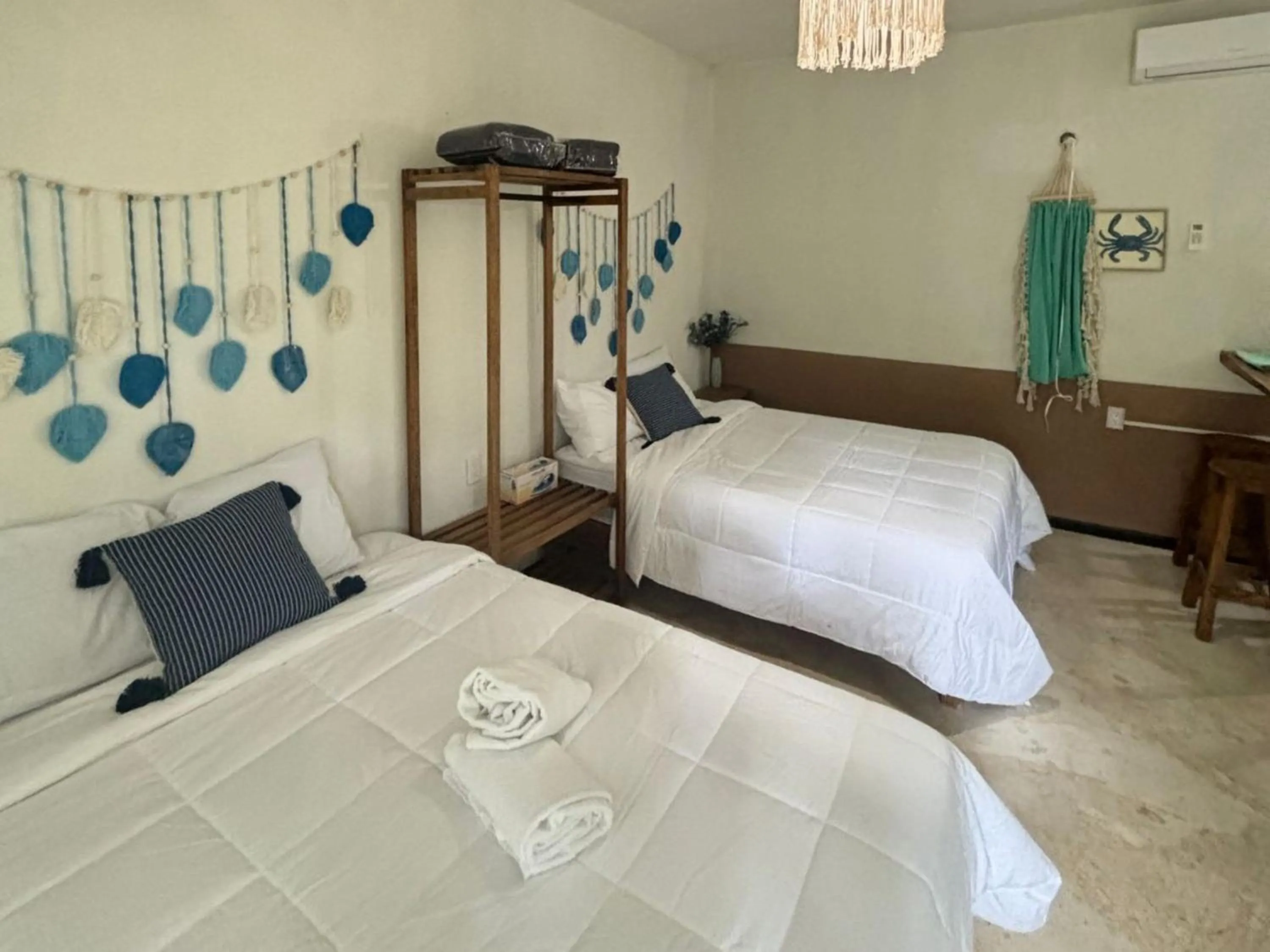 Bed in BACALAR INN Hotel