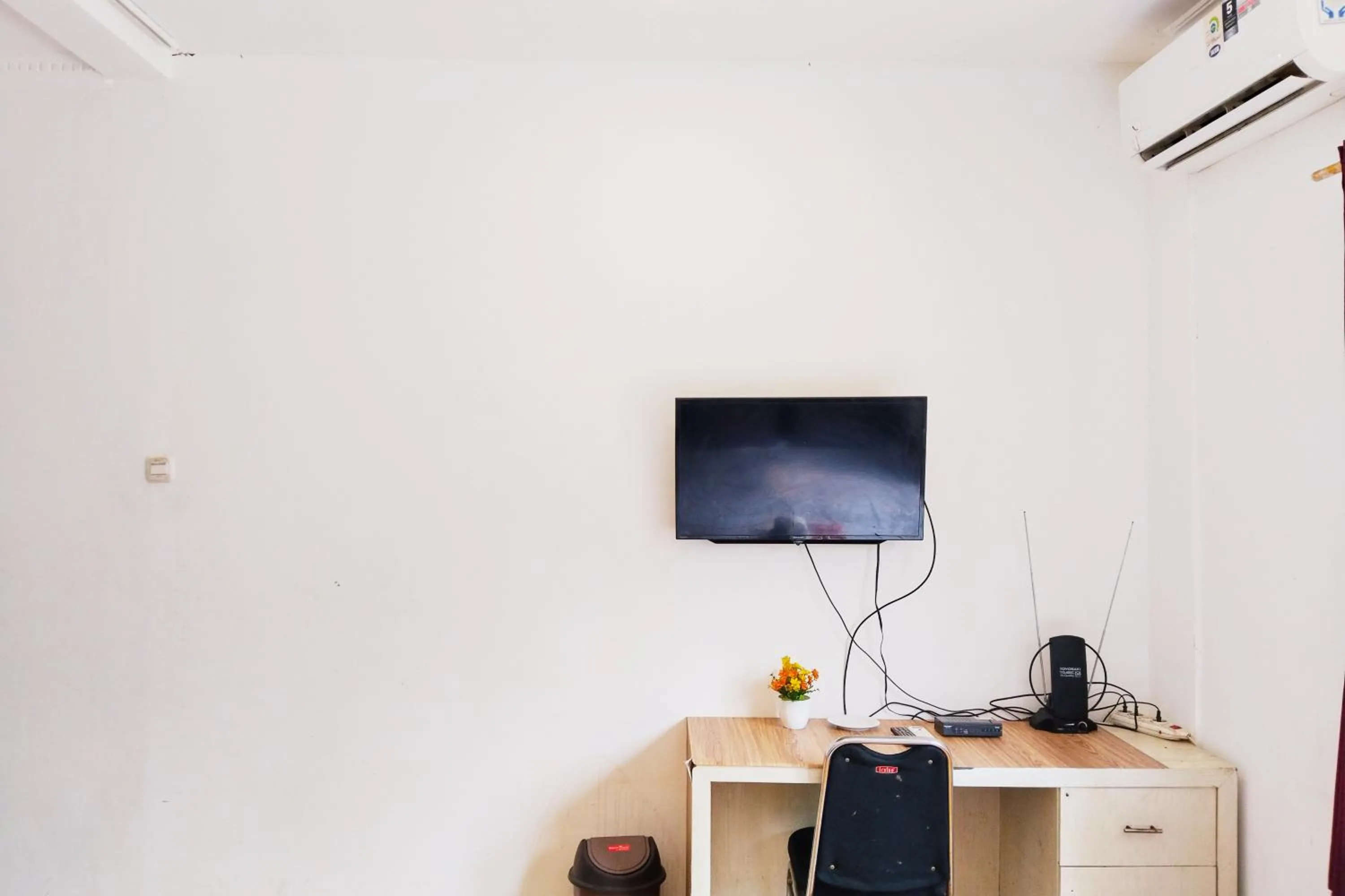 TV and multimedia in NamRoom at Kebayoran Baru