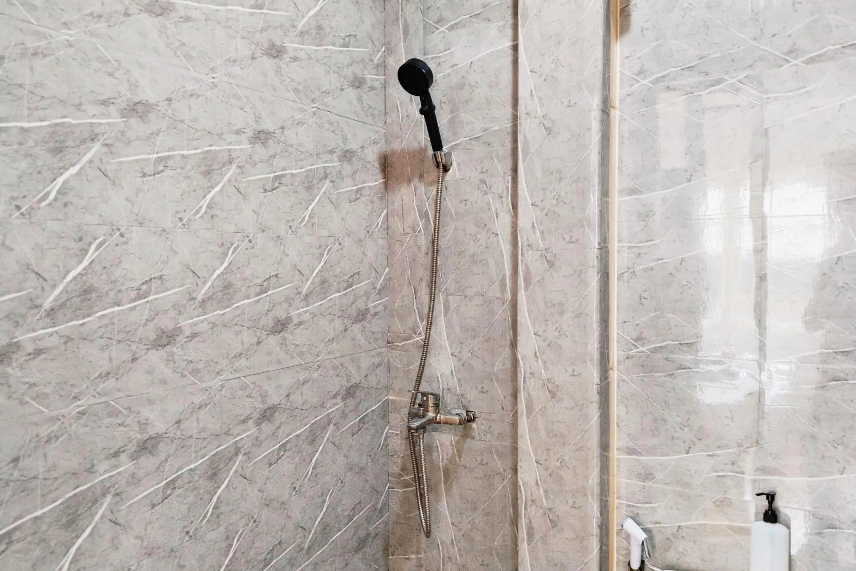 Shower in NamRoom at Kebayoran Baru