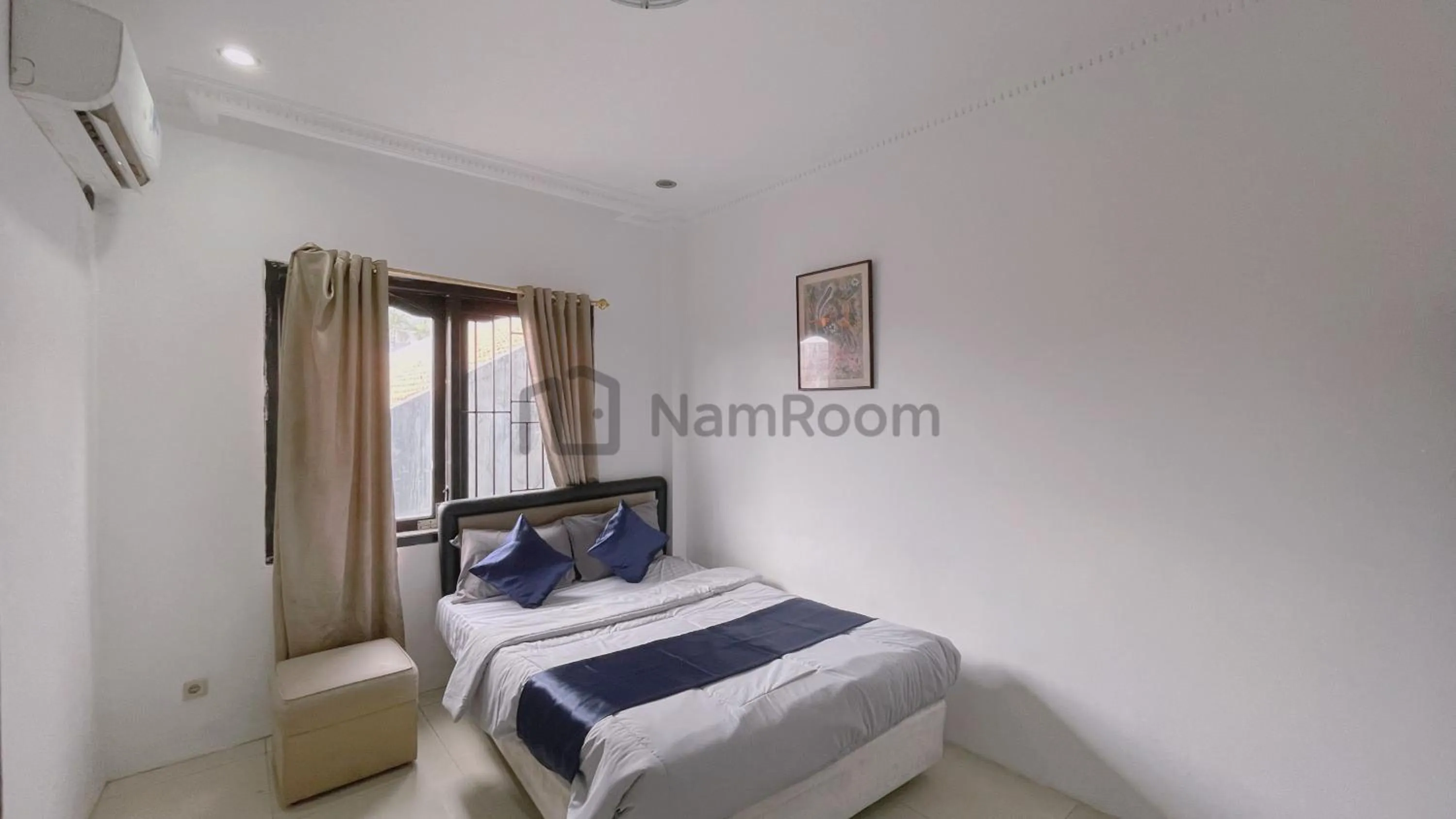 Bed in NamRoom at Kebayoran Baru