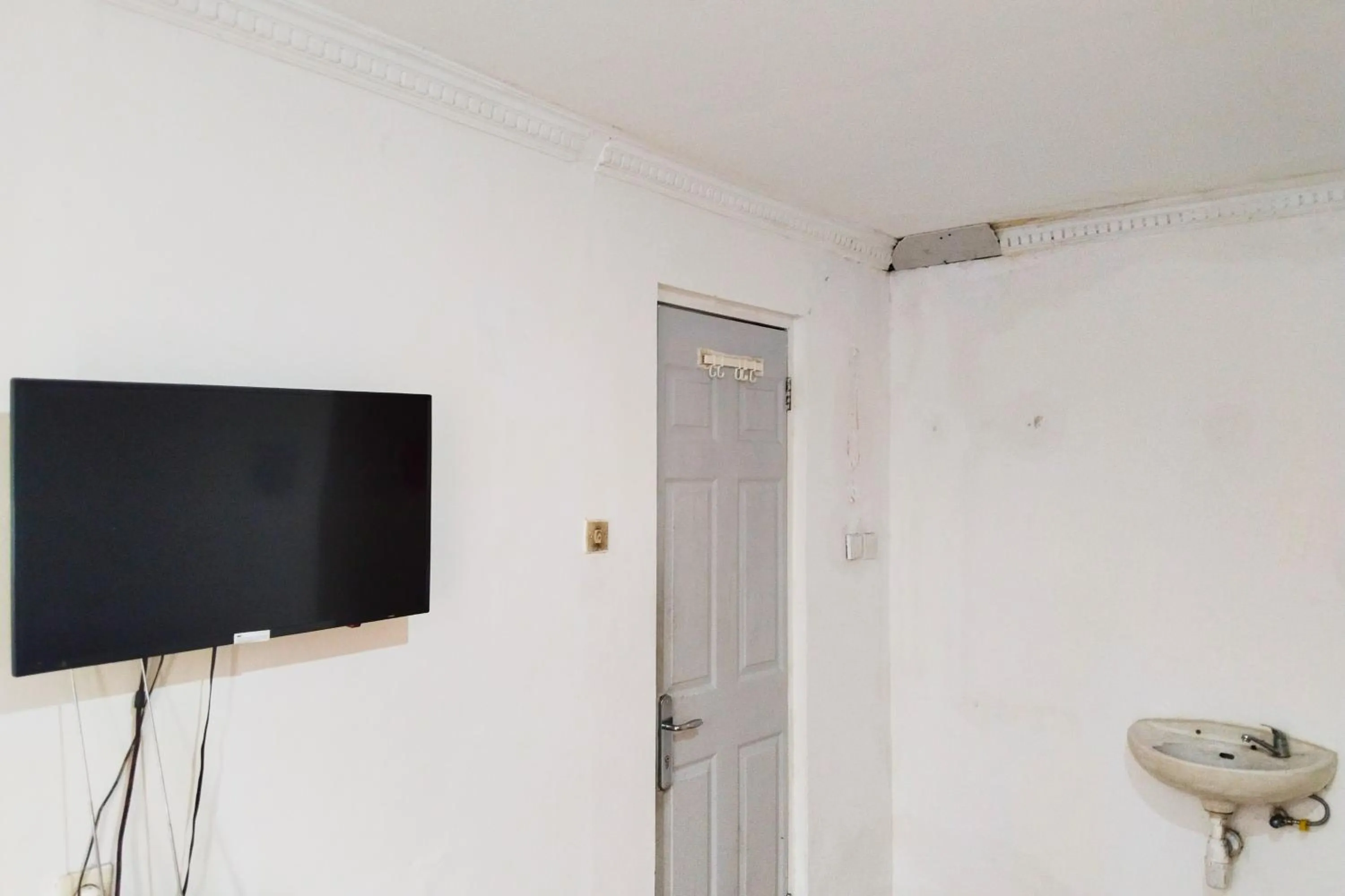 TV and multimedia in NamRoom at Kebayoran Baru