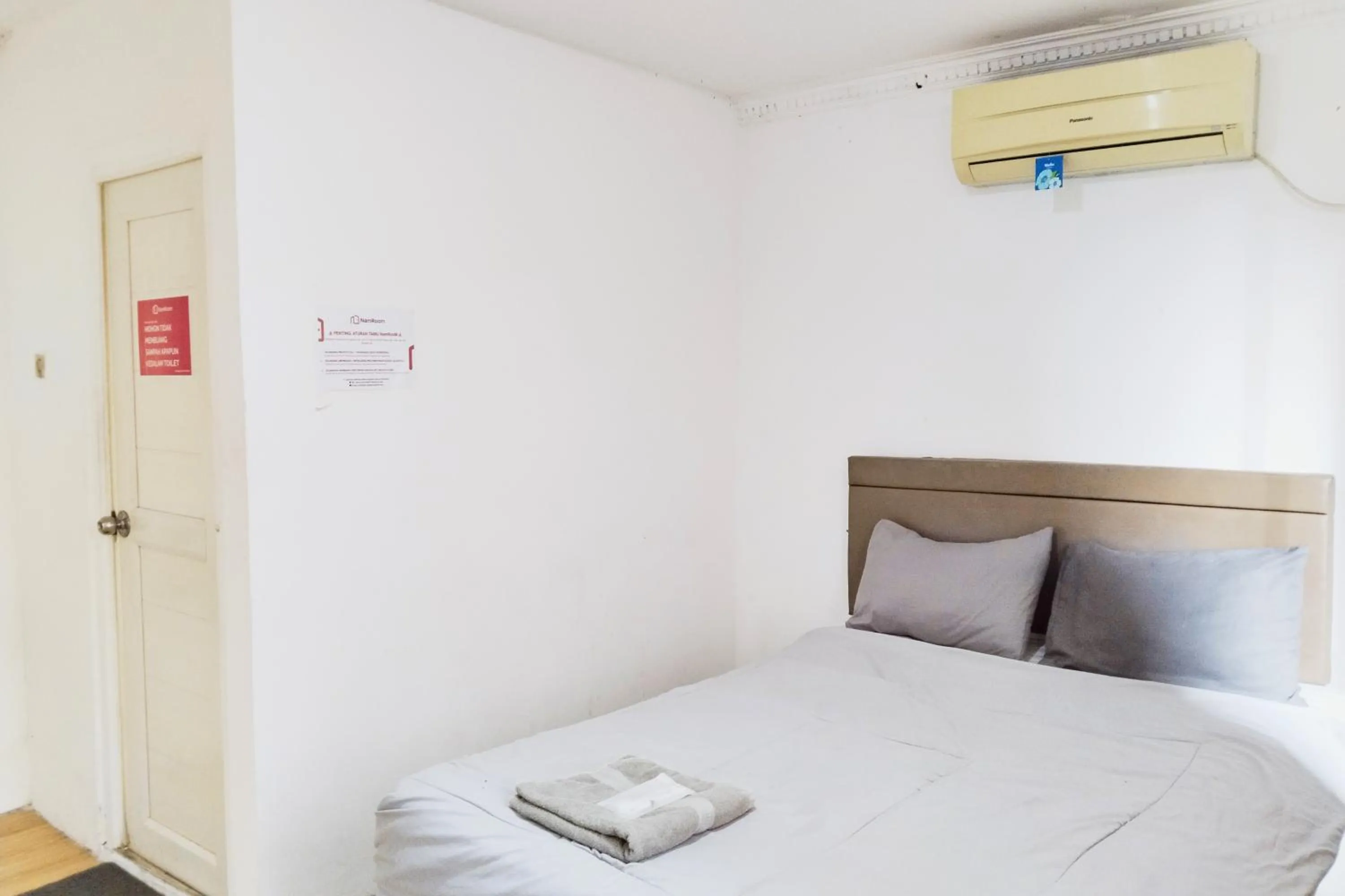 Bed in NamRoom at Kebayoran Baru