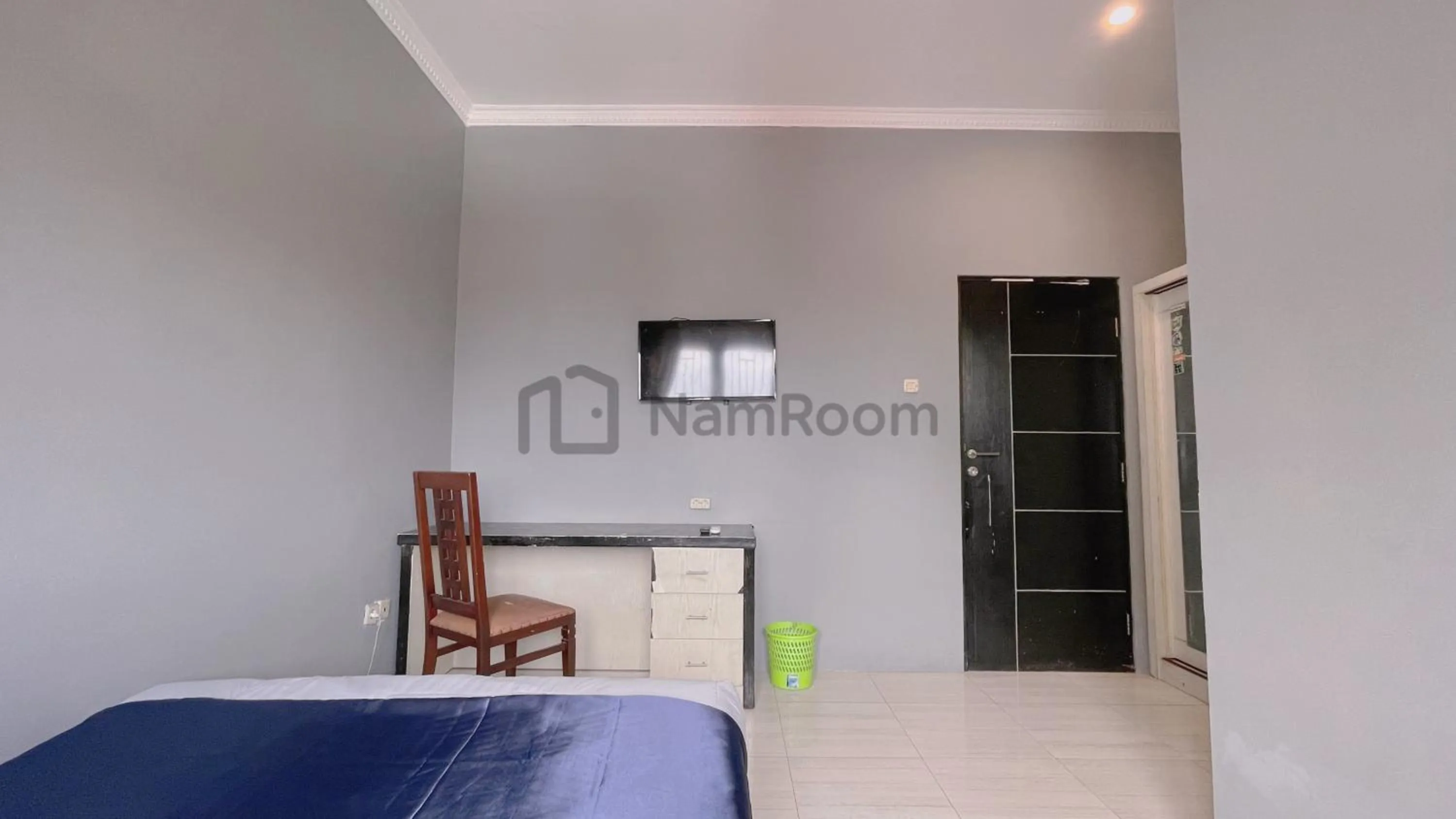 Bed in NamRoom at Kebayoran Baru