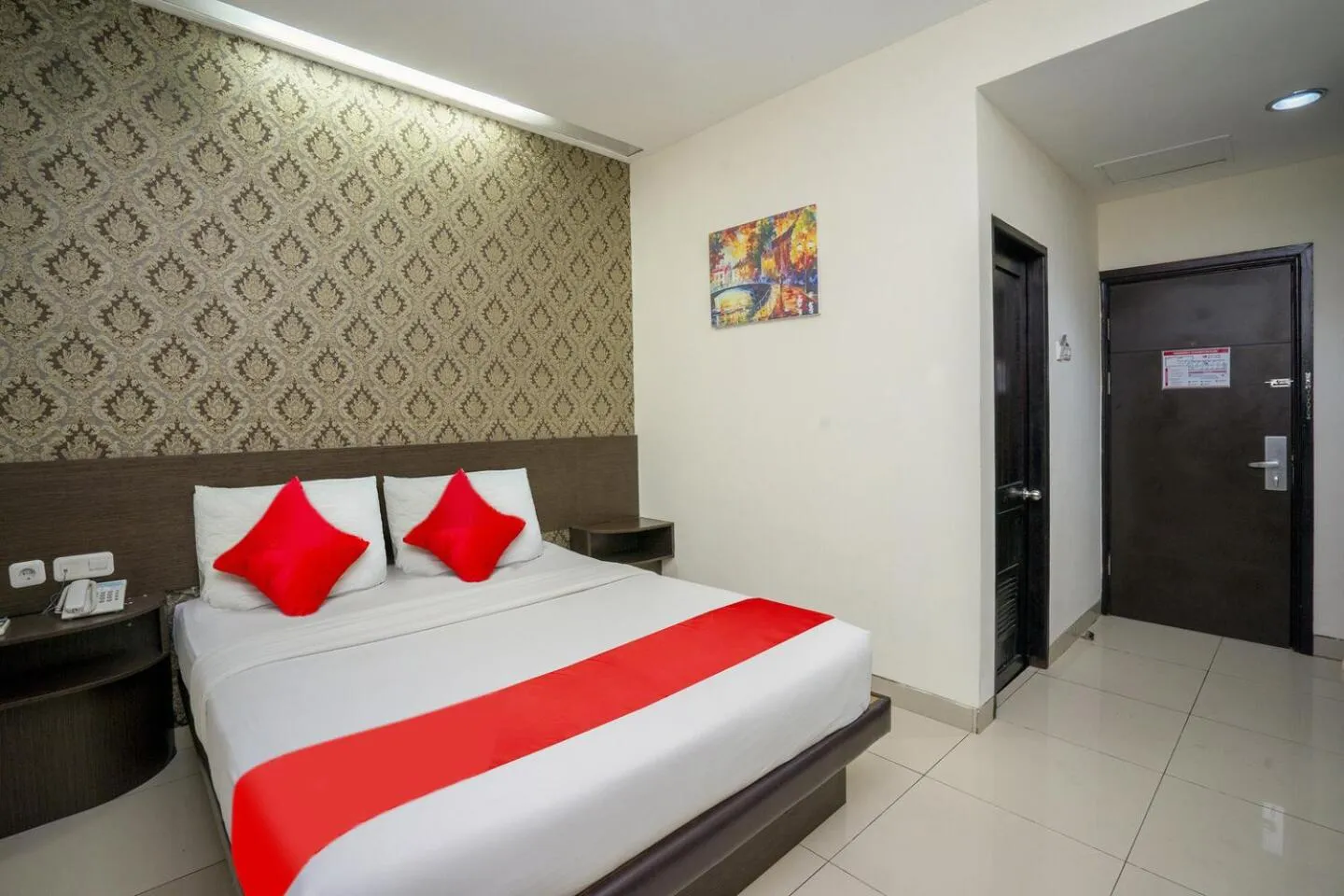 Bed in Hotel Grand Kartika