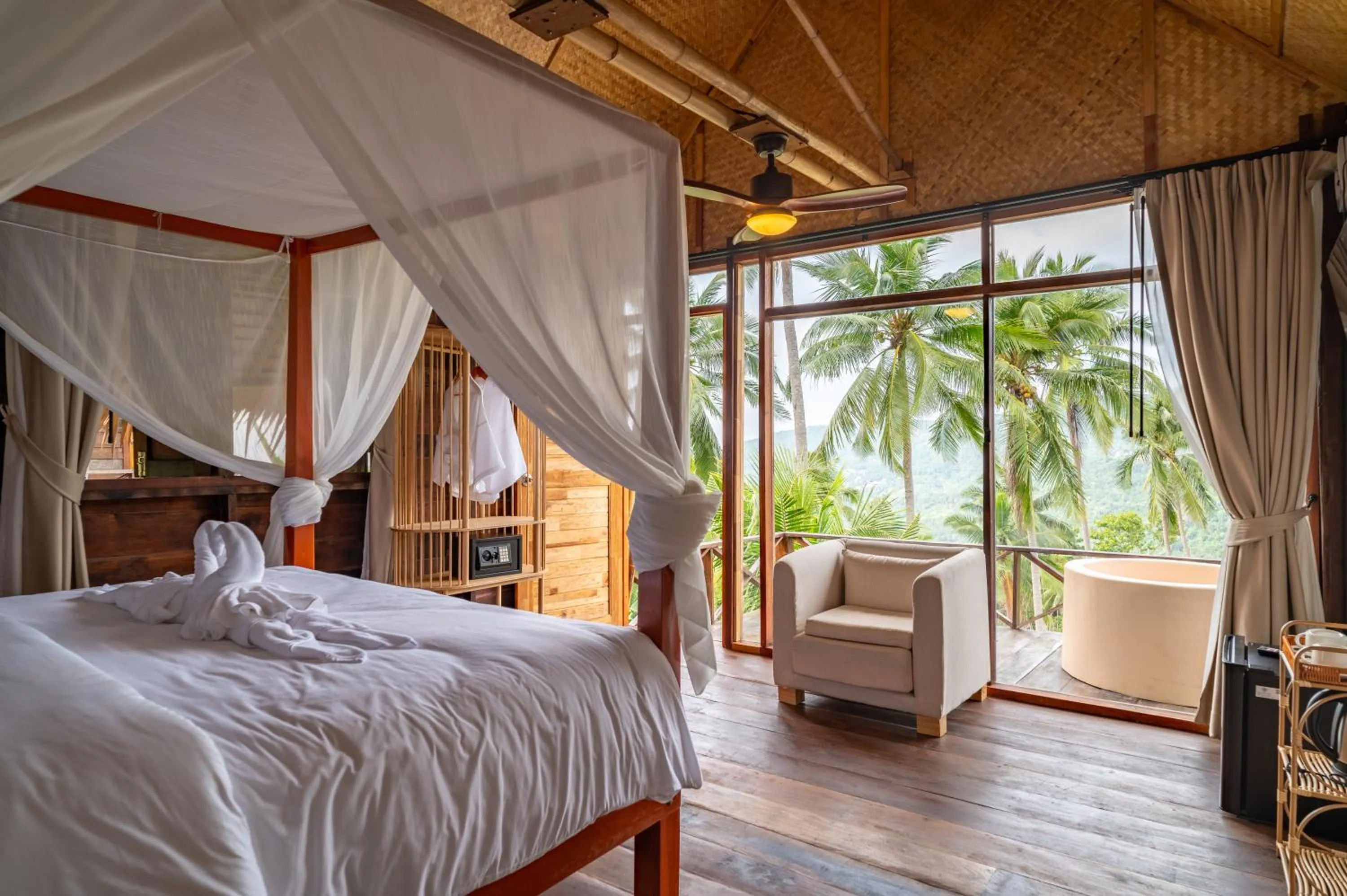 Photo of the whole room, Bed in RoomQuest THEVA Resort Koh Samui