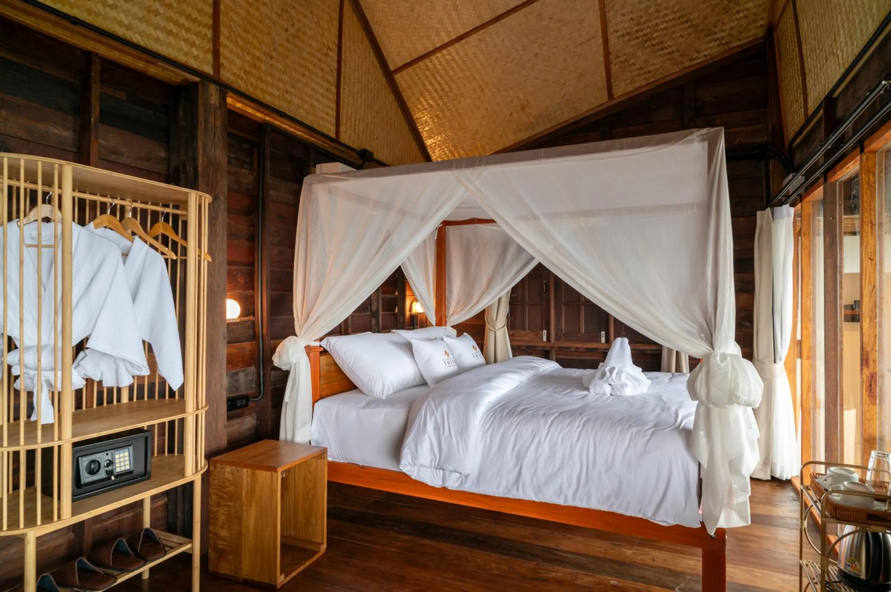 Bed in RoomQuest THEVA Resort Koh Samui